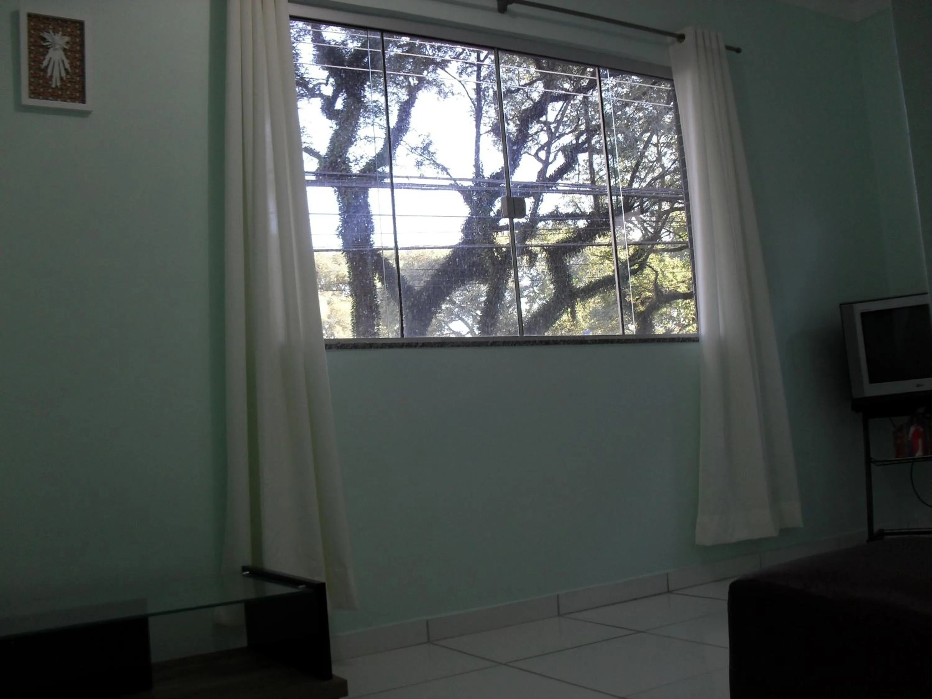 Communal lounge/ TV room in Hotel Niteroi
