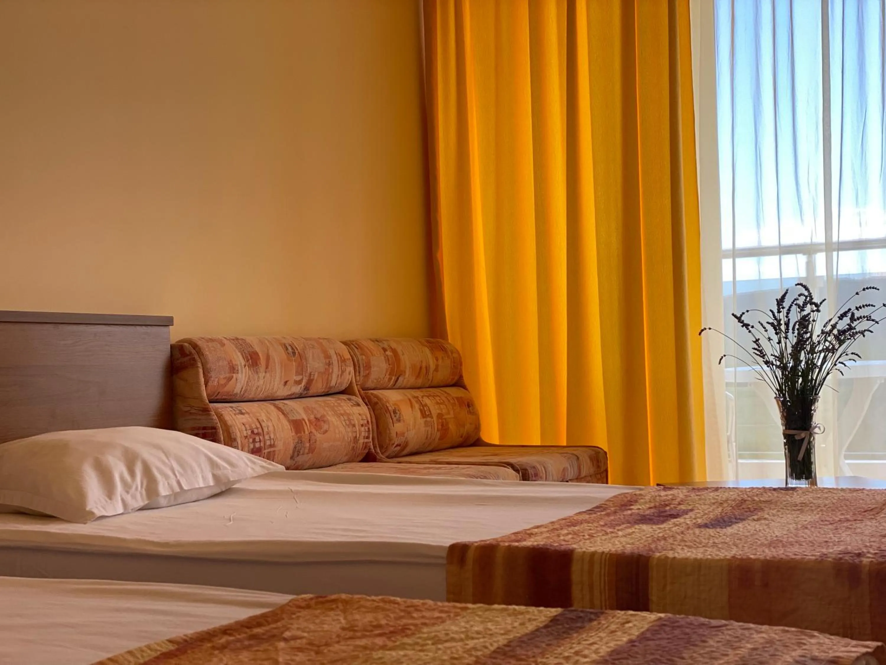 Bed in Hotel Plamena Palace