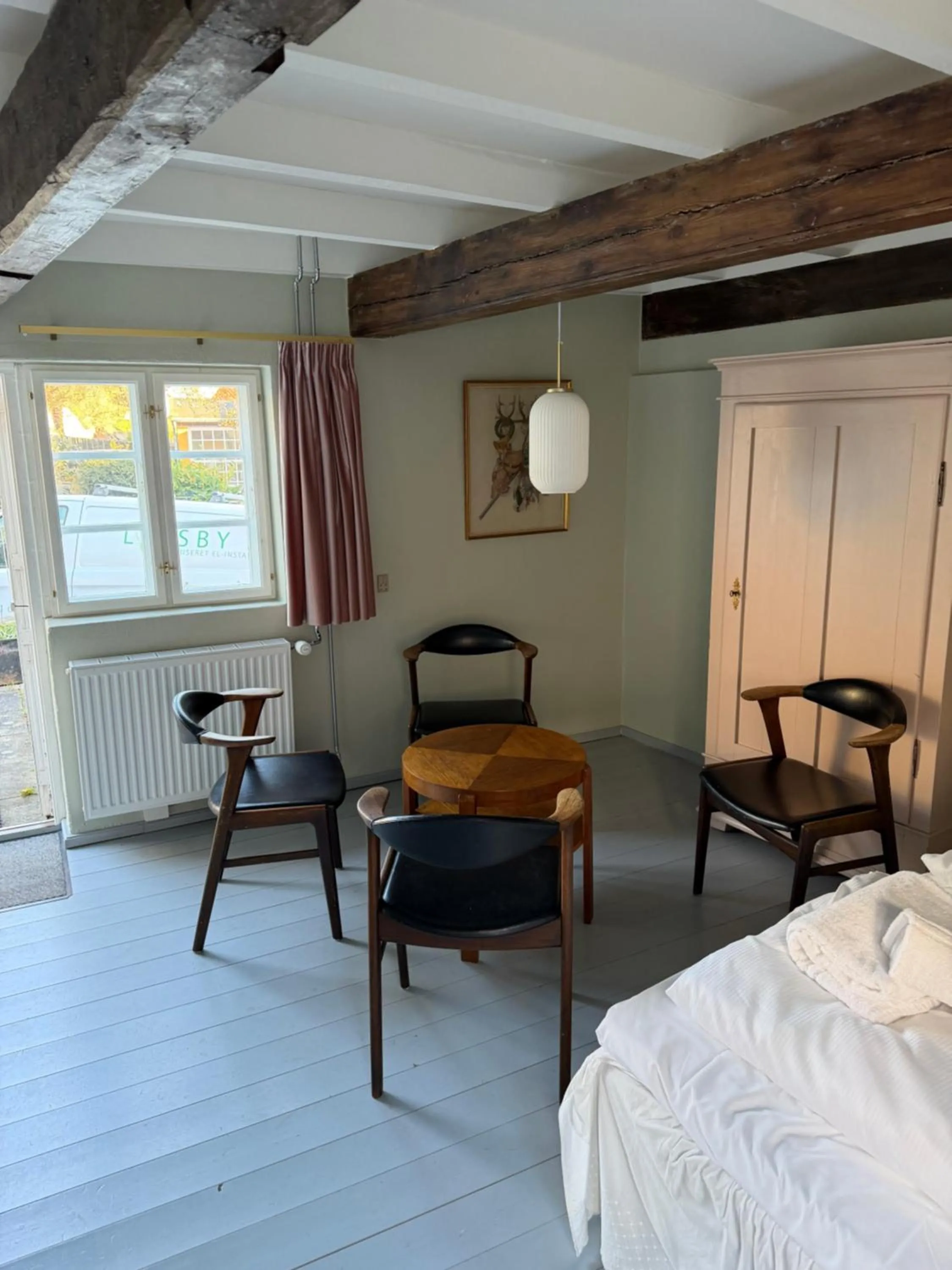 Living room, Bed in JANTZENs HOTEL