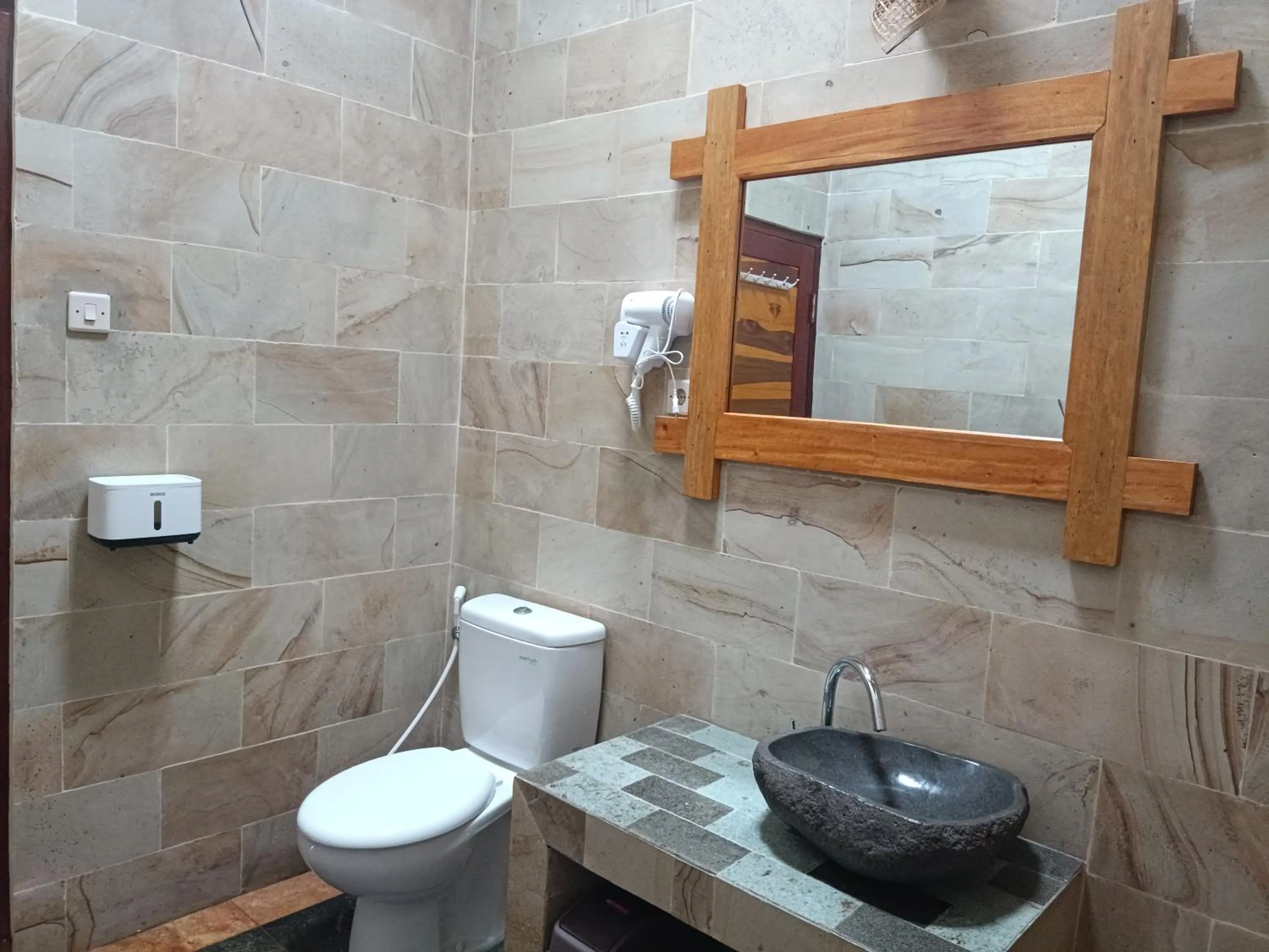 Toilet in Villa Kinagu