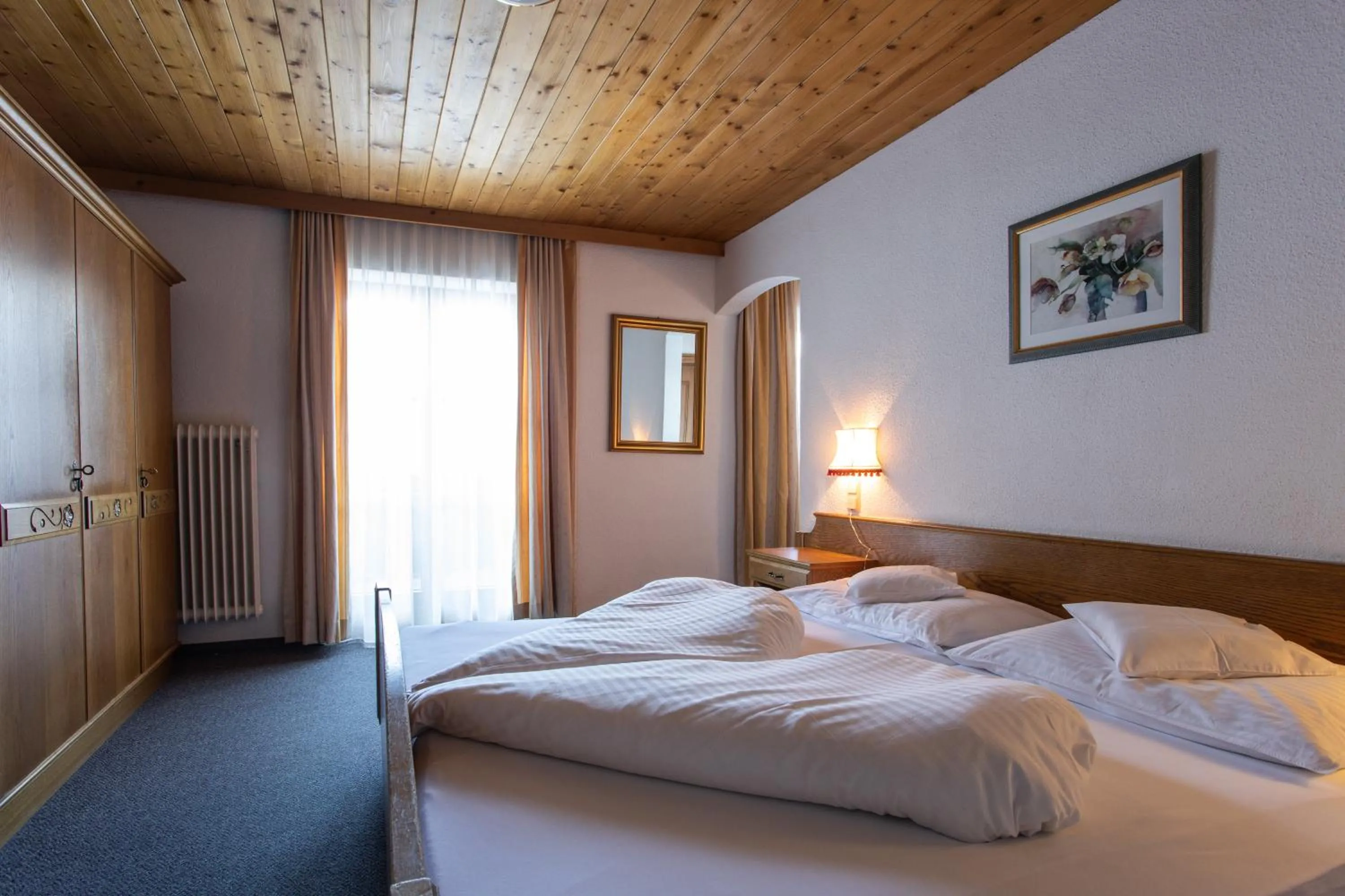 Photo of the whole room, Bed in Pension Tirol