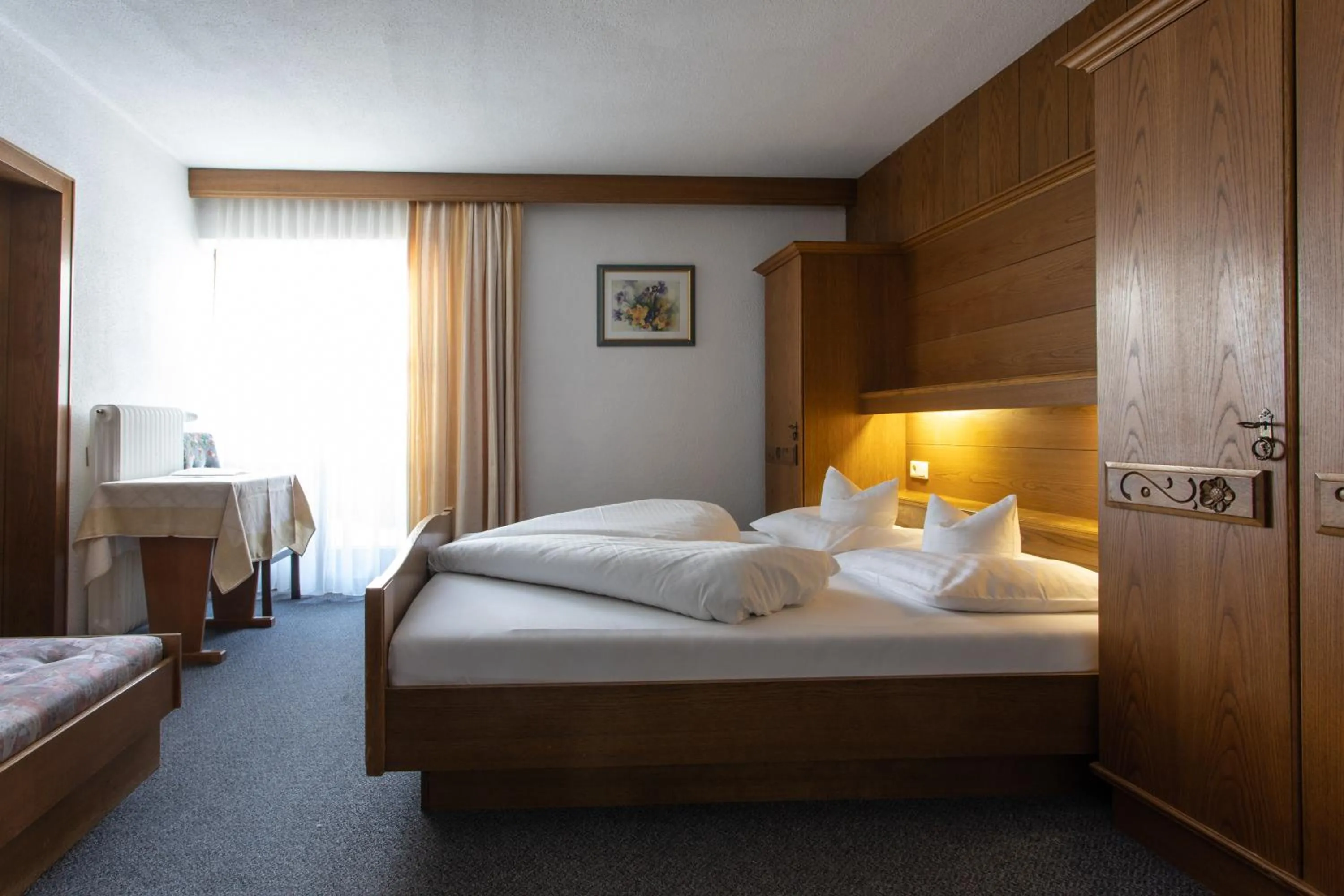 Photo of the whole room, Bed in Pension Tirol