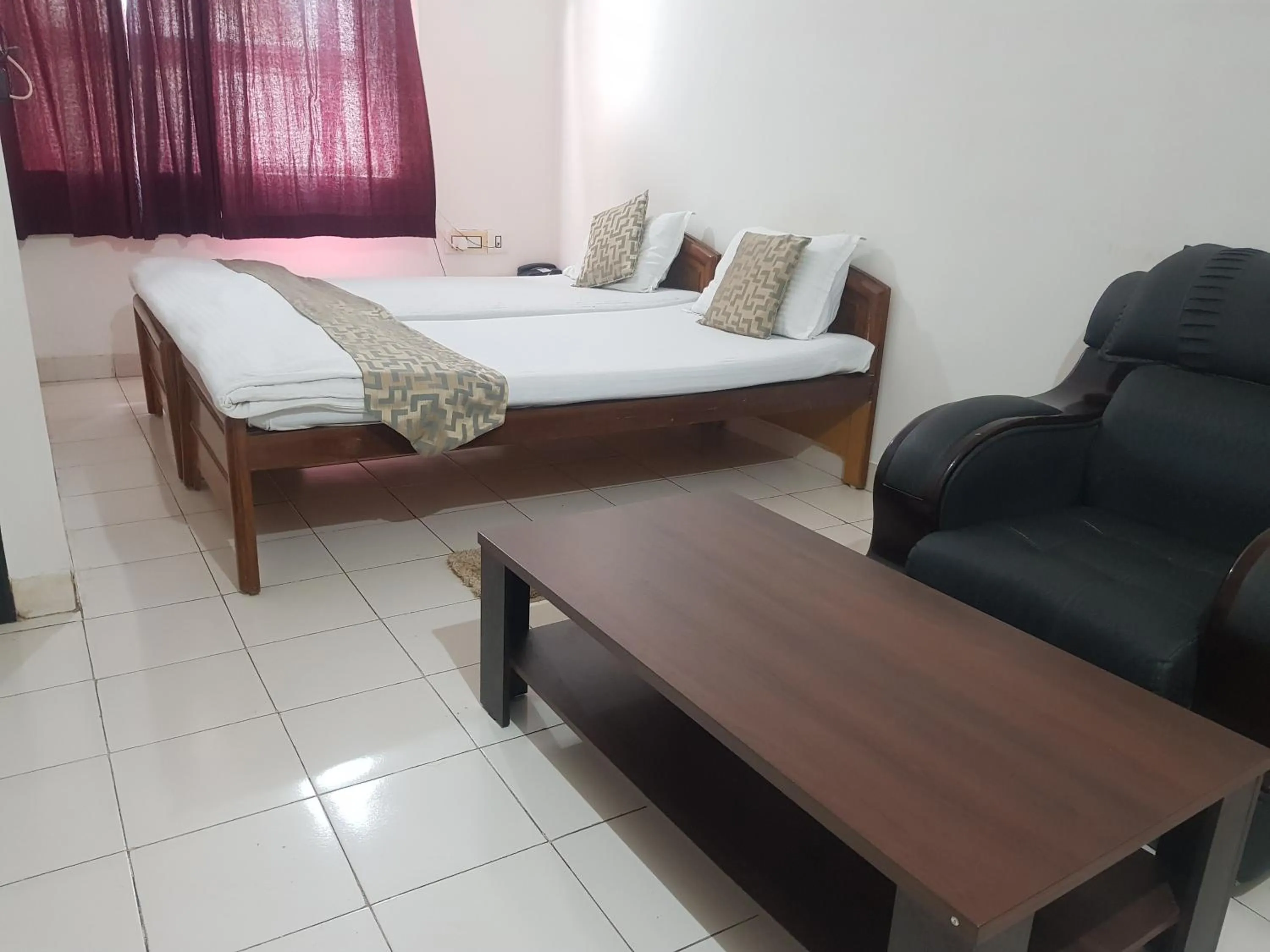 Bed in Hotel Arham Inn