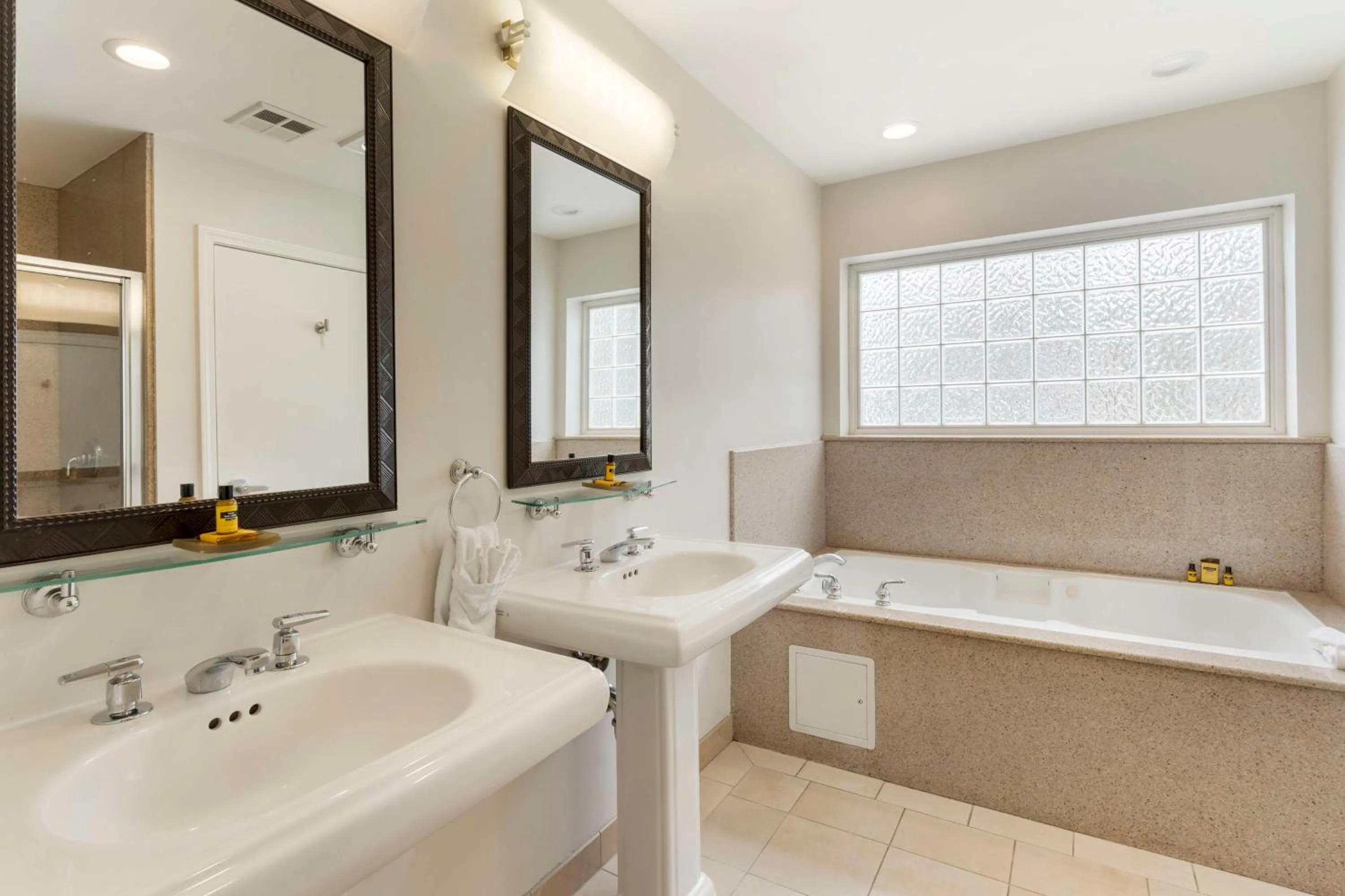 Bathroom in Best Western Plus All Suites Inn