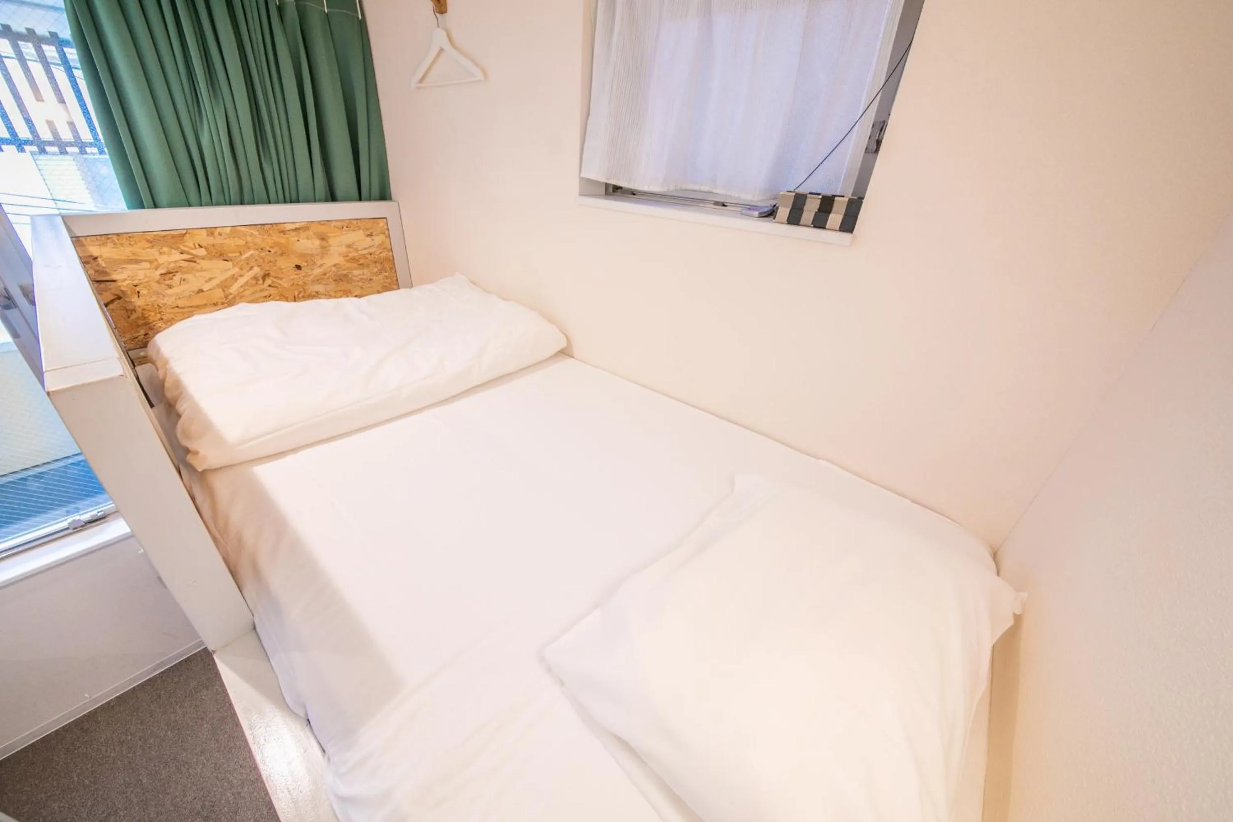 Bed in KIZUNA HOTEL Gojo Kiyomizu-dera Kamogawa