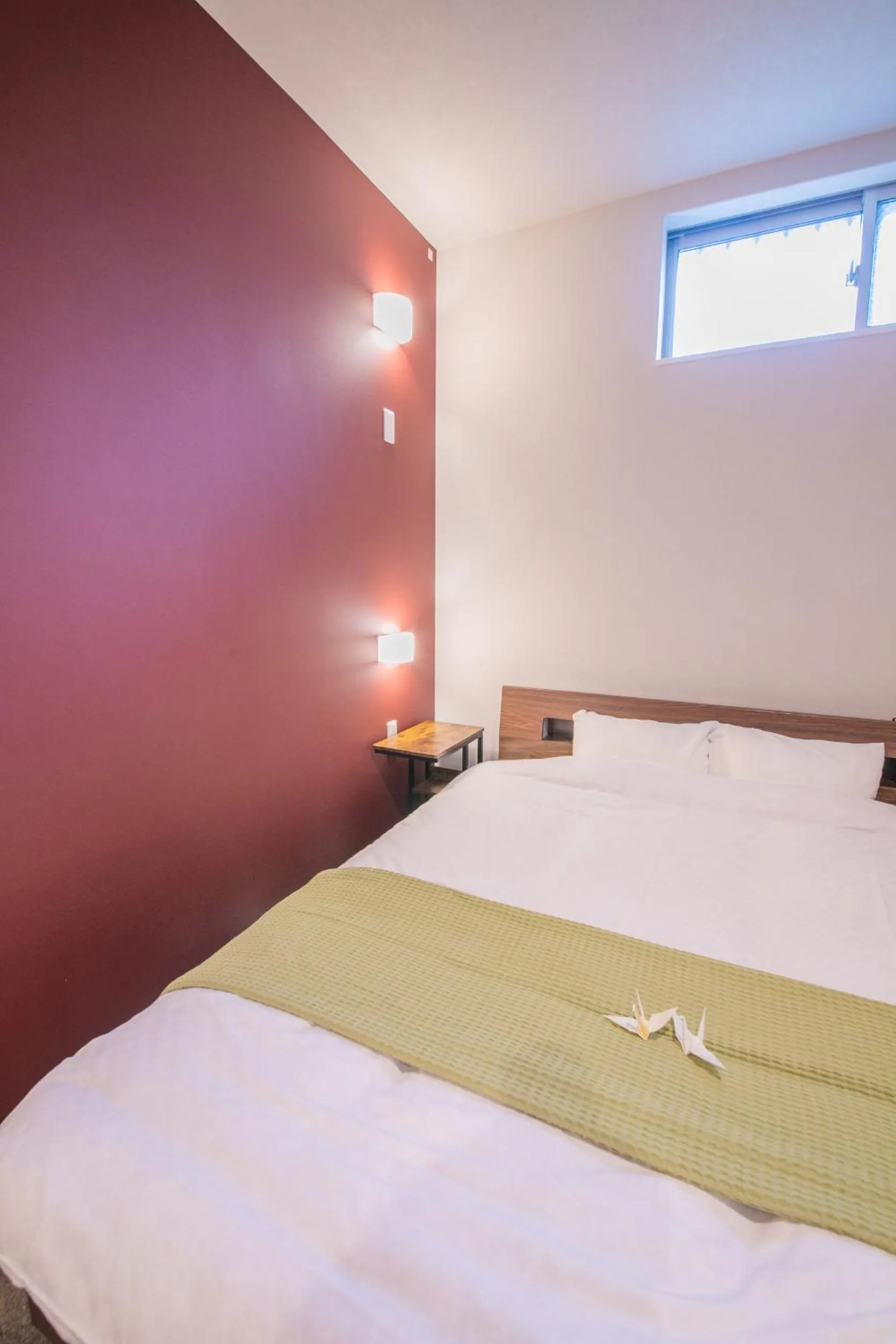 Bed in KIZUNA HOTEL Gojo Kiyomizu-dera Kamogawa