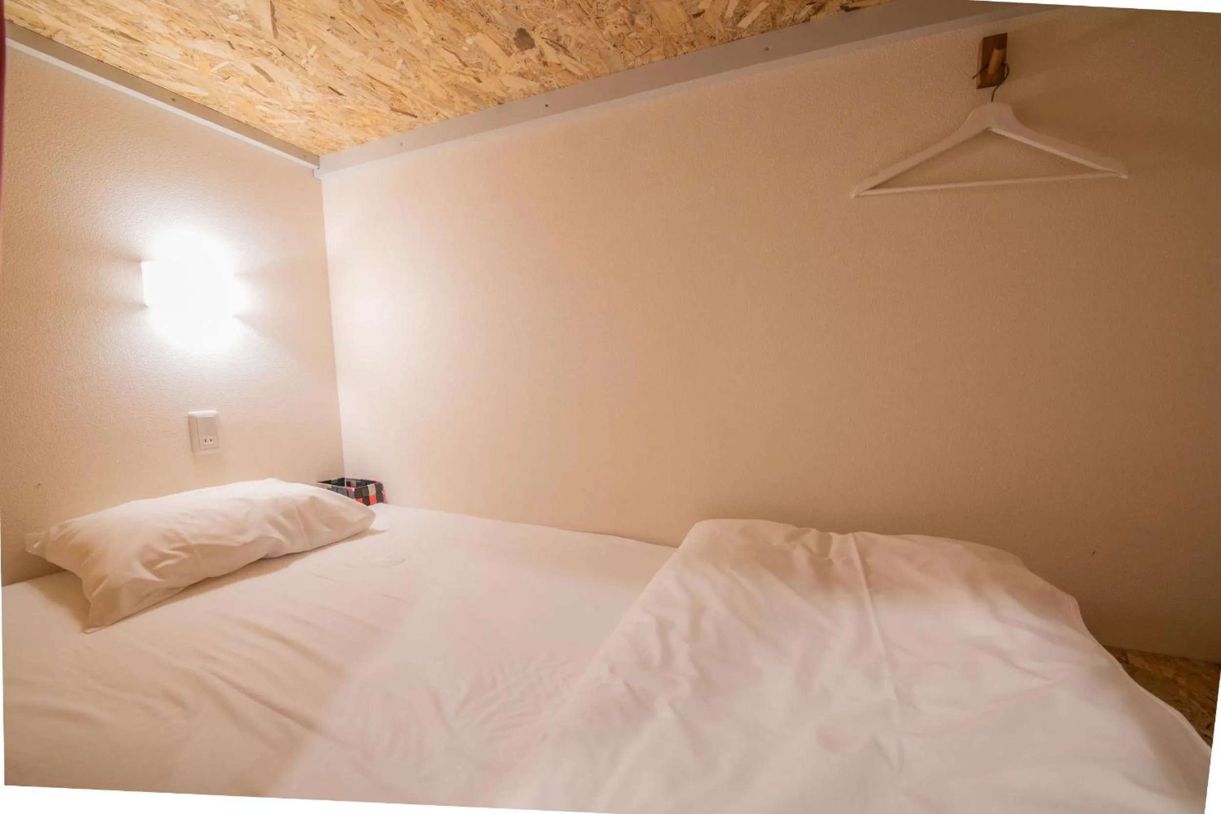 Bed in KIZUNA HOTEL Gojo Kiyomizu-dera Kamogawa