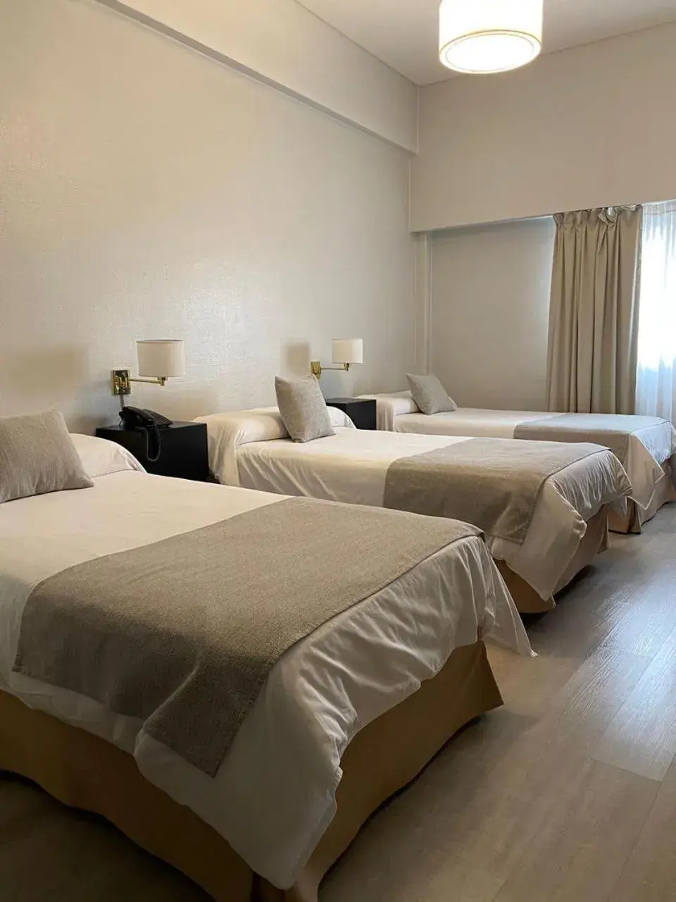 Bed in Hotel La Perla Bed in Hotel La Perla