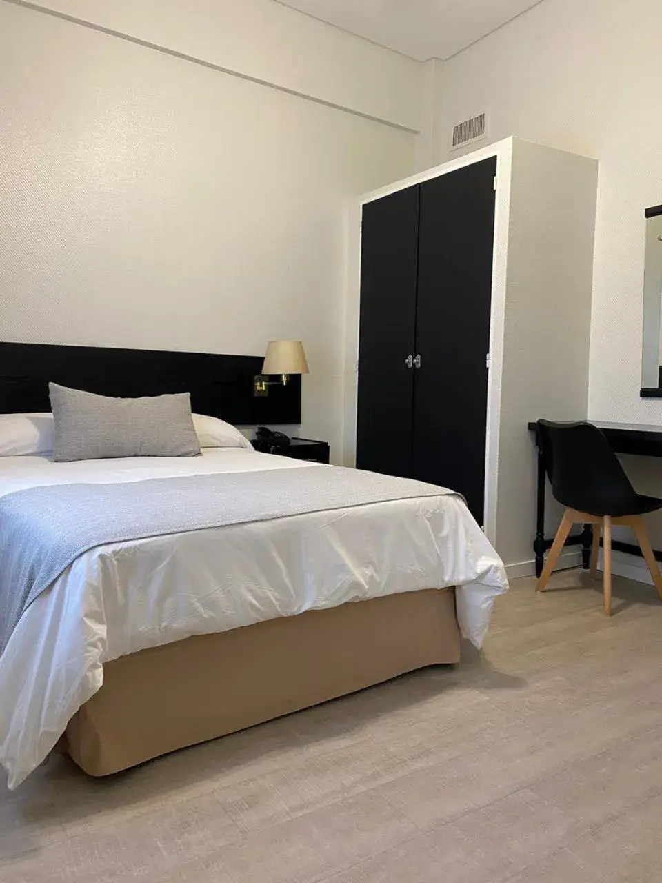 Bed in Hotel La Perla Bed in Hotel La Perla