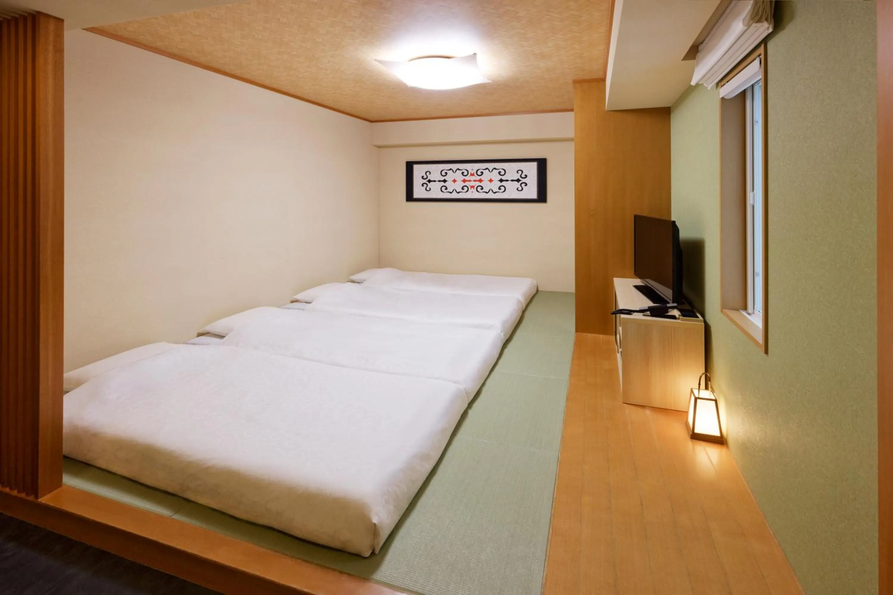 Photo of the whole room, Bed in karaksa hotel Sapporo