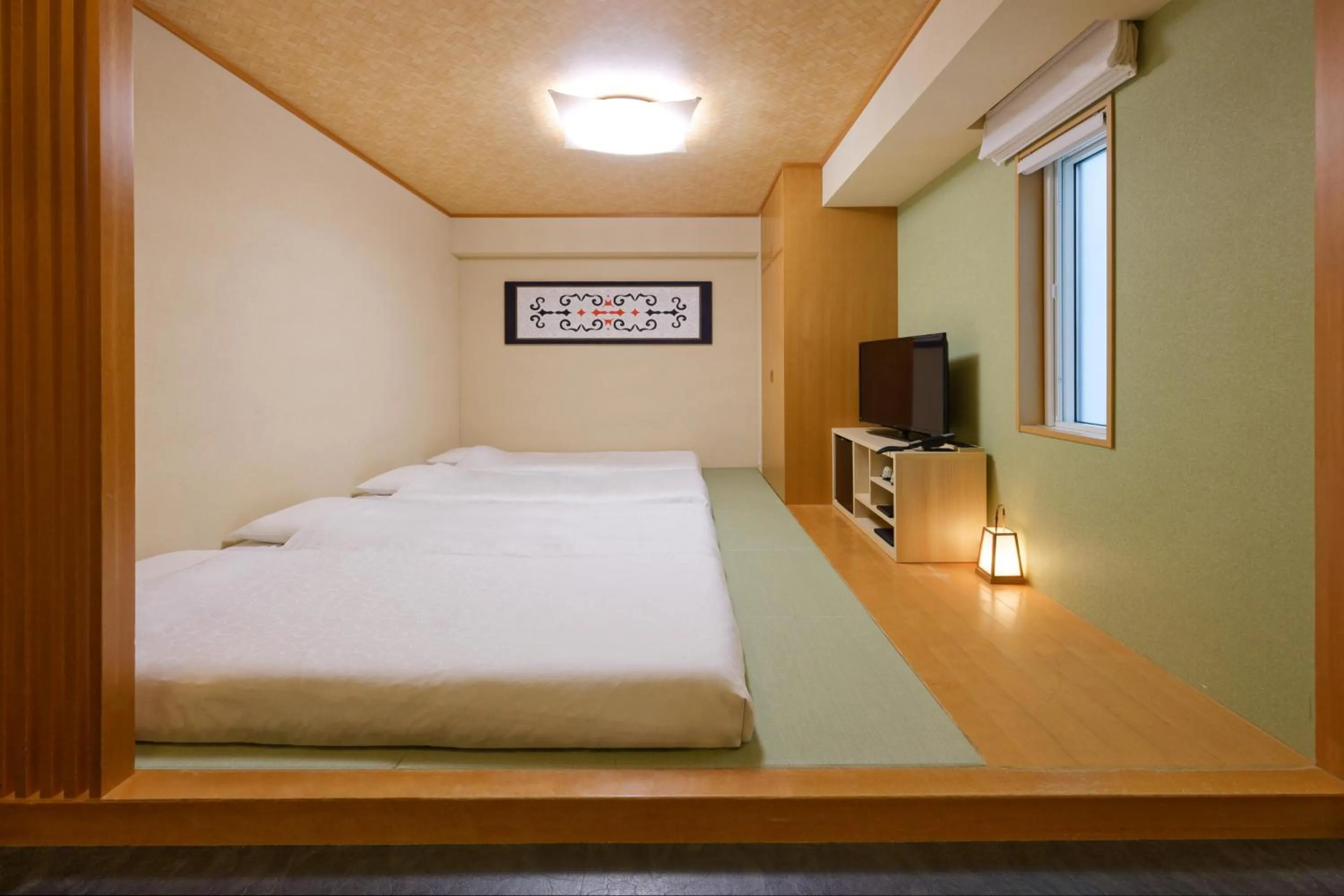 Photo of the whole room, Bed in karaksa hotel Sapporo