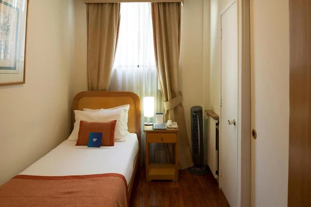 Bed in Hotel Presidente