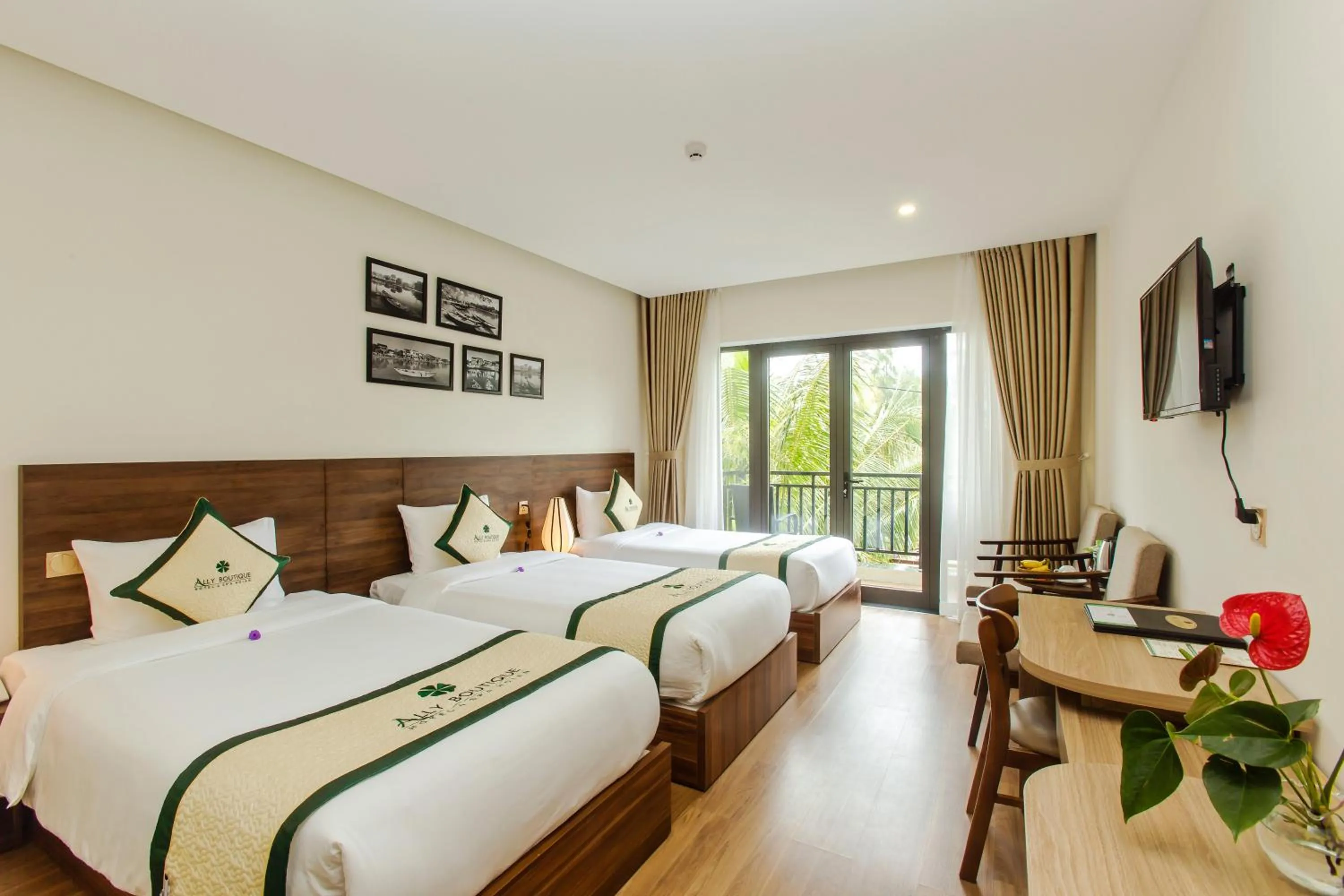 Photo of the whole room, Bed in Ally Beach Boutique Hotel Hoian