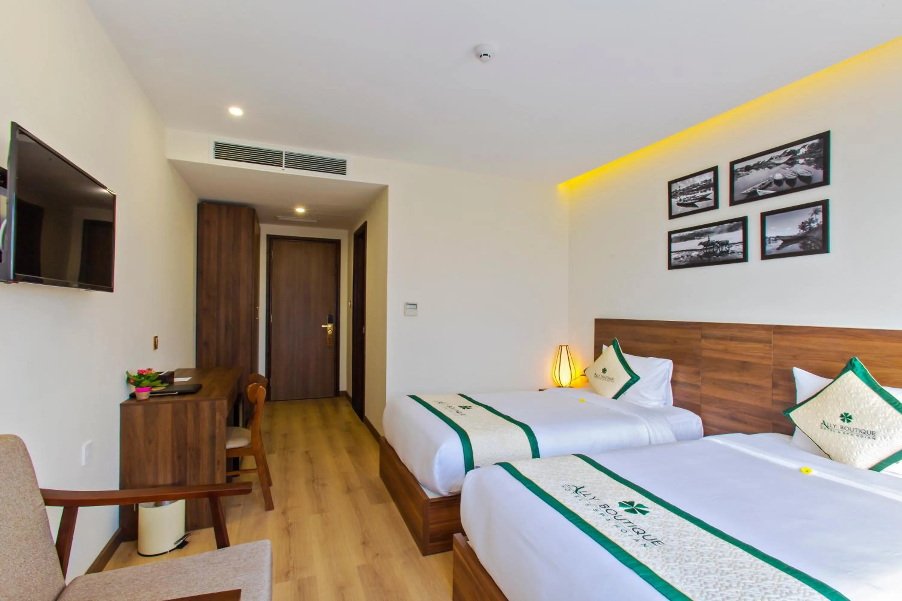 Photo of the whole room, Bed in Ally Beach Boutique Hotel Hoian