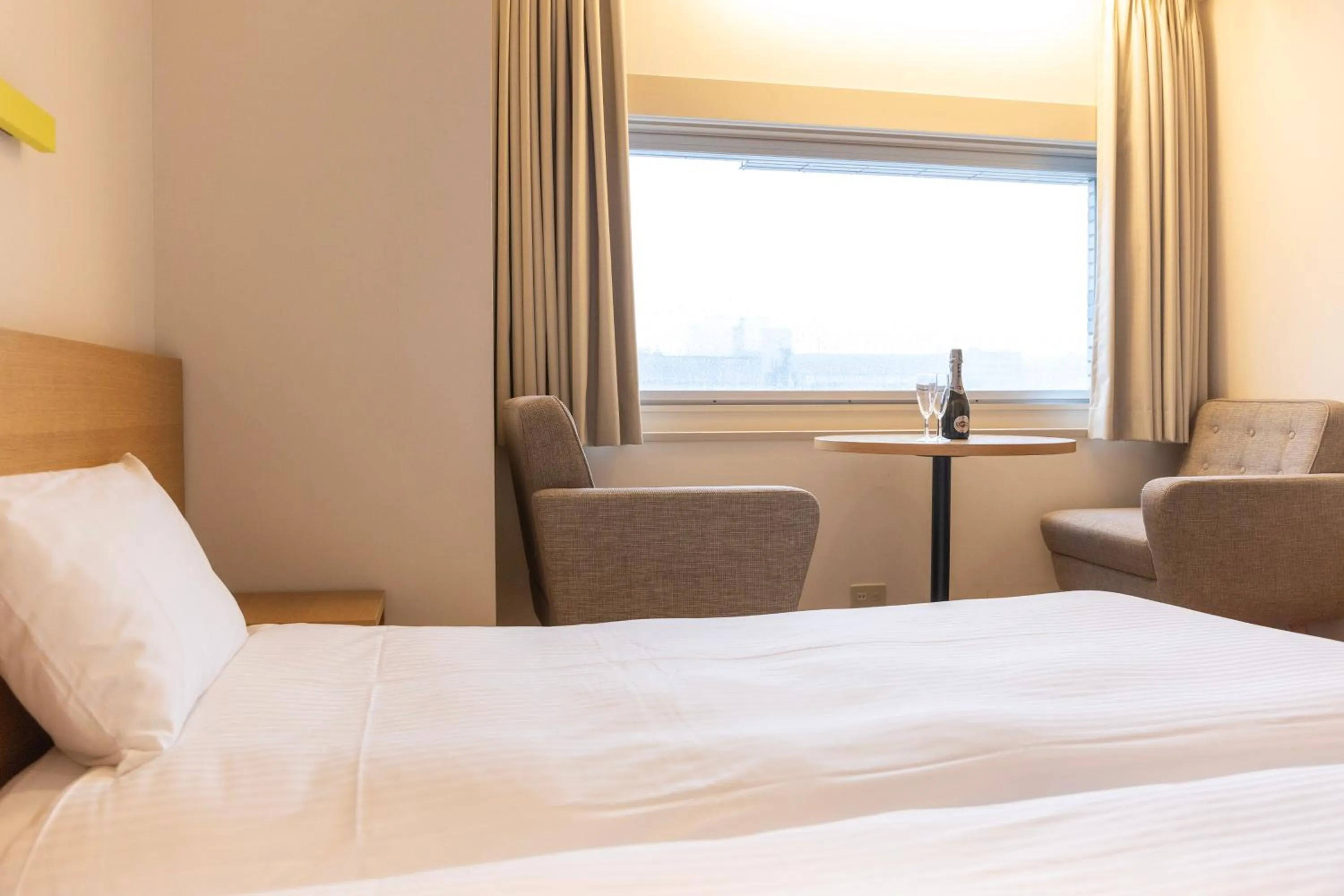 Bed in Hotel Gracery Ginza