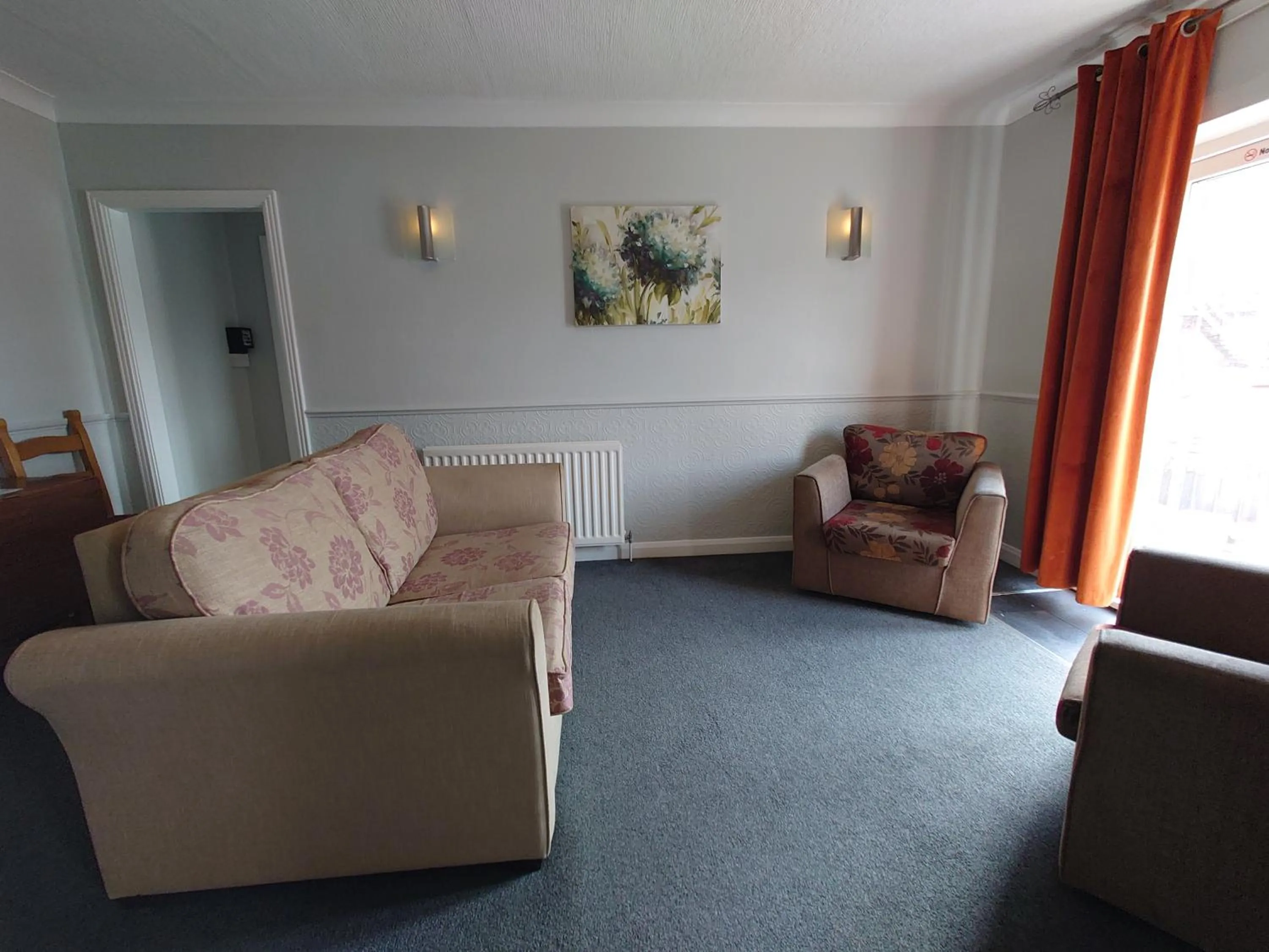 Living room in Coasters Holiday Apartments