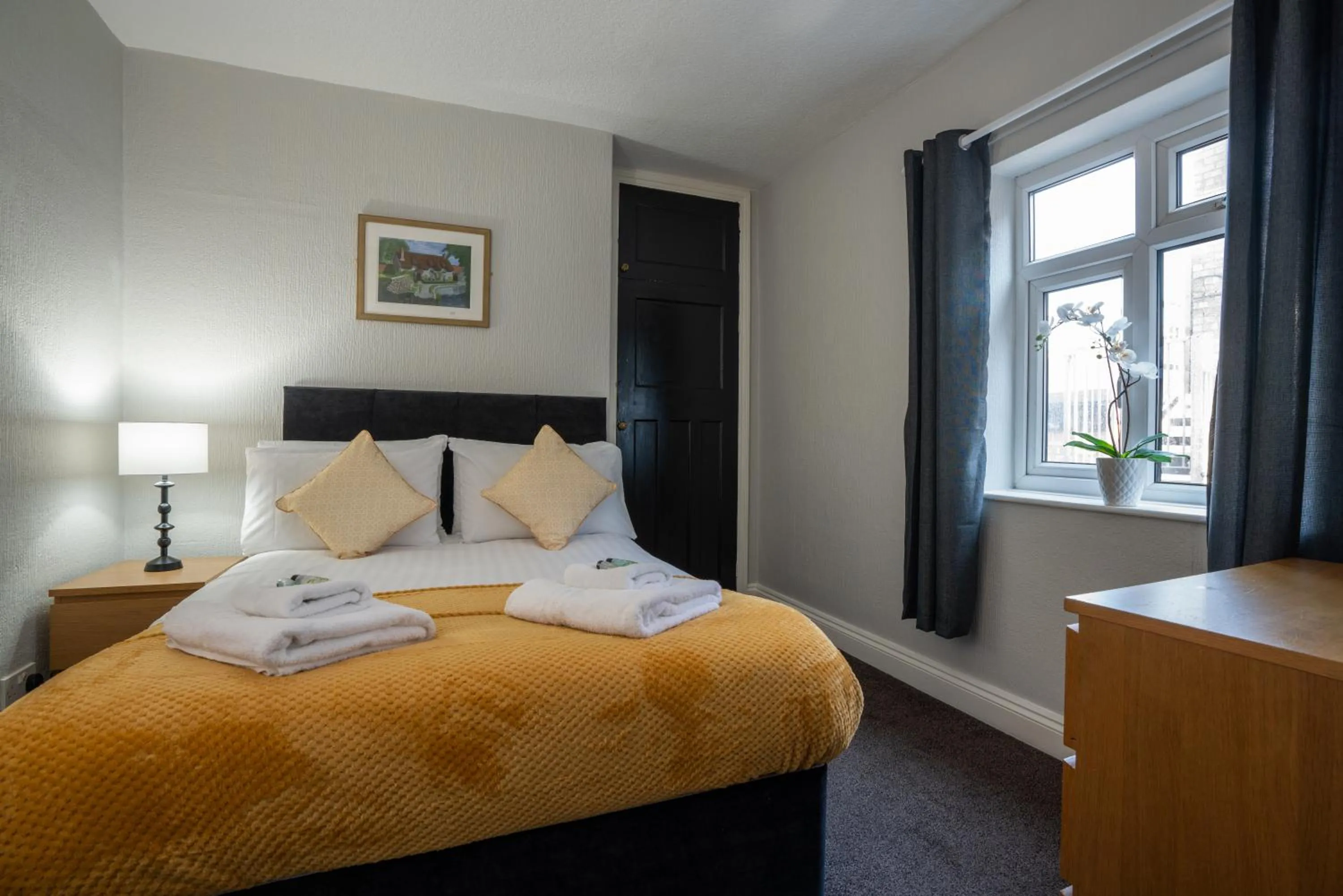 Bed in Coasters Holiday Apartments