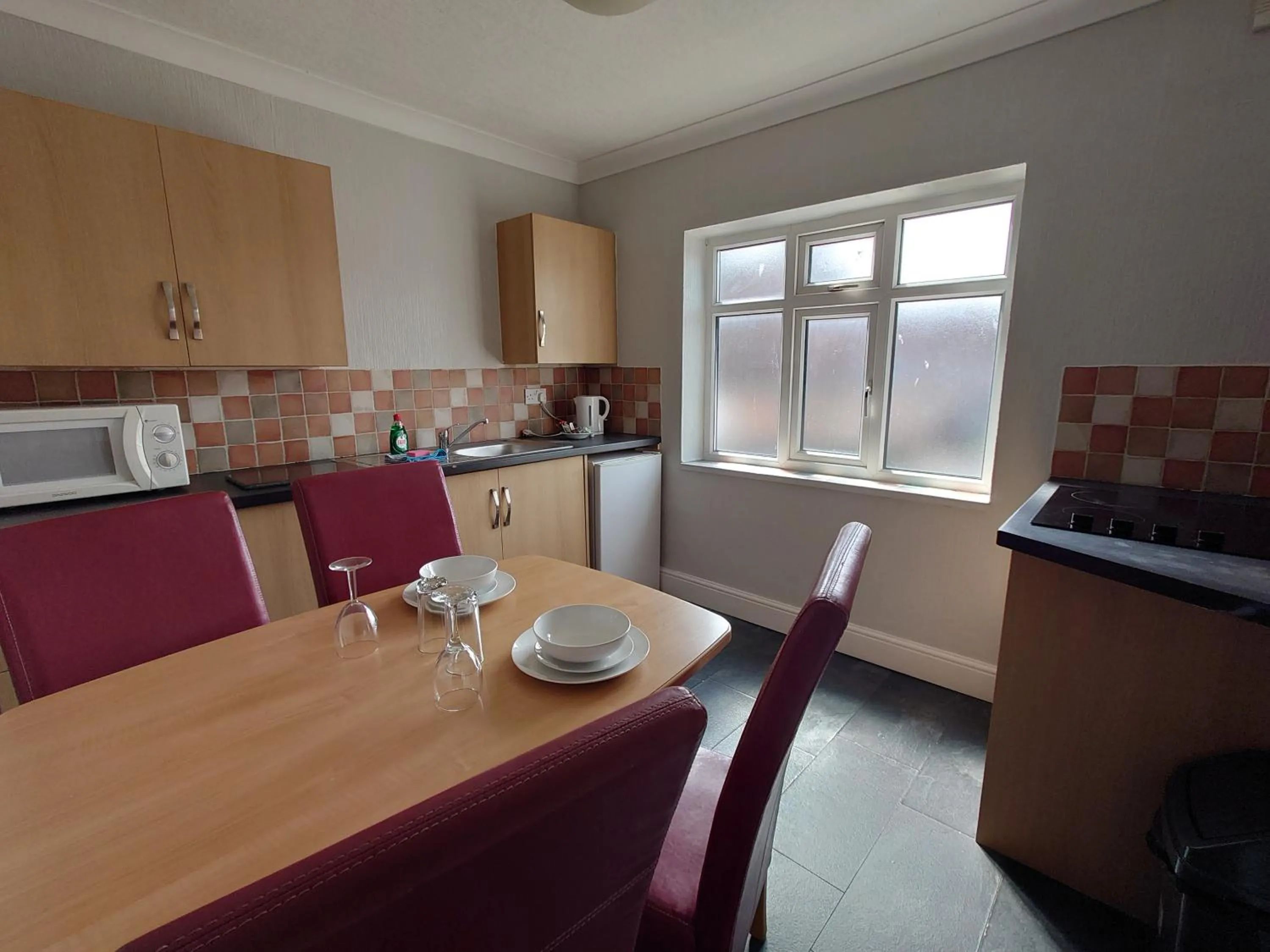 Kitchen or kitchenette in Coasters Holiday Apartments