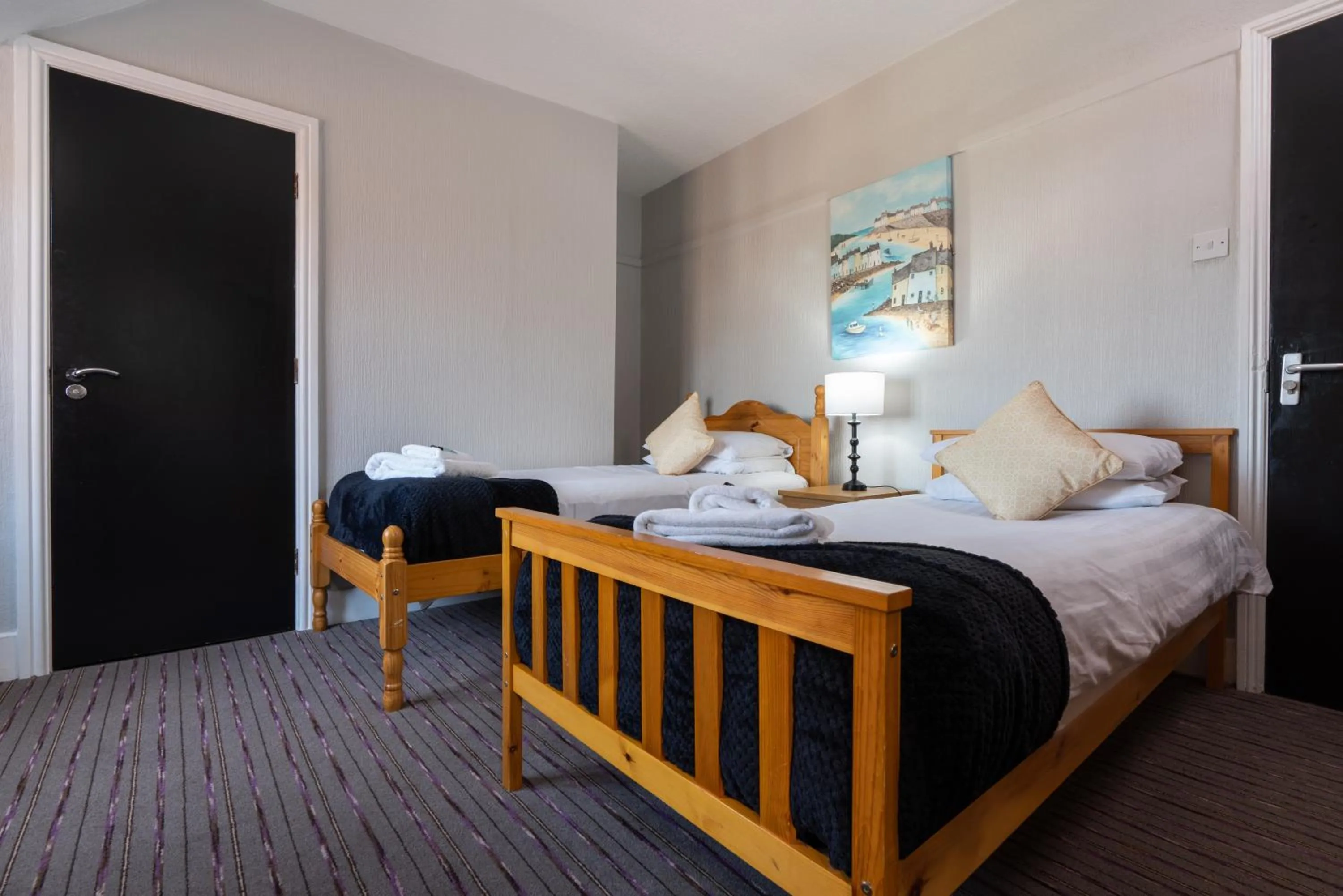 Bedroom in Coasters Holiday Apartments