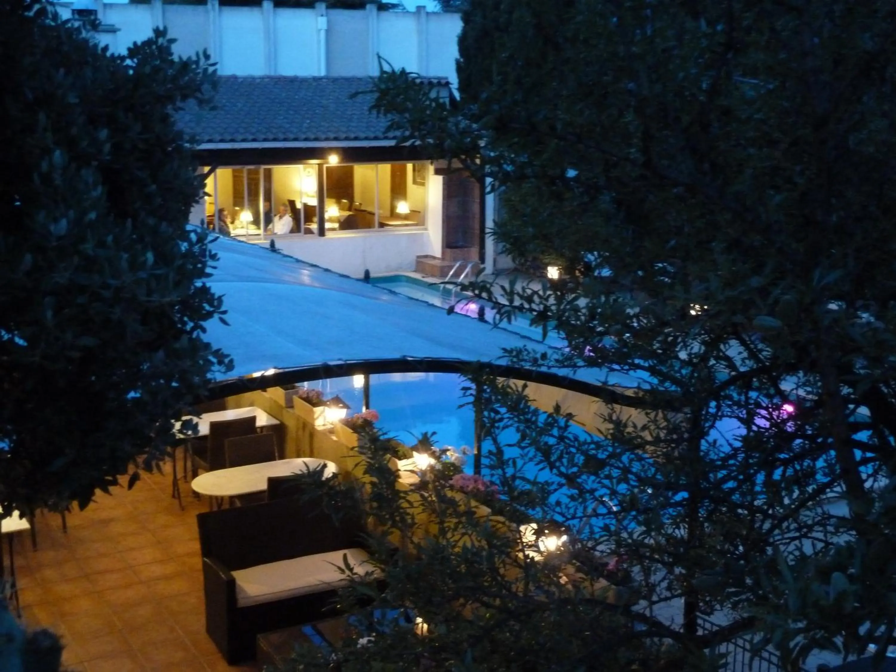 Patio in Logis Hôtel - Restaurant Résidence Les Cèdres