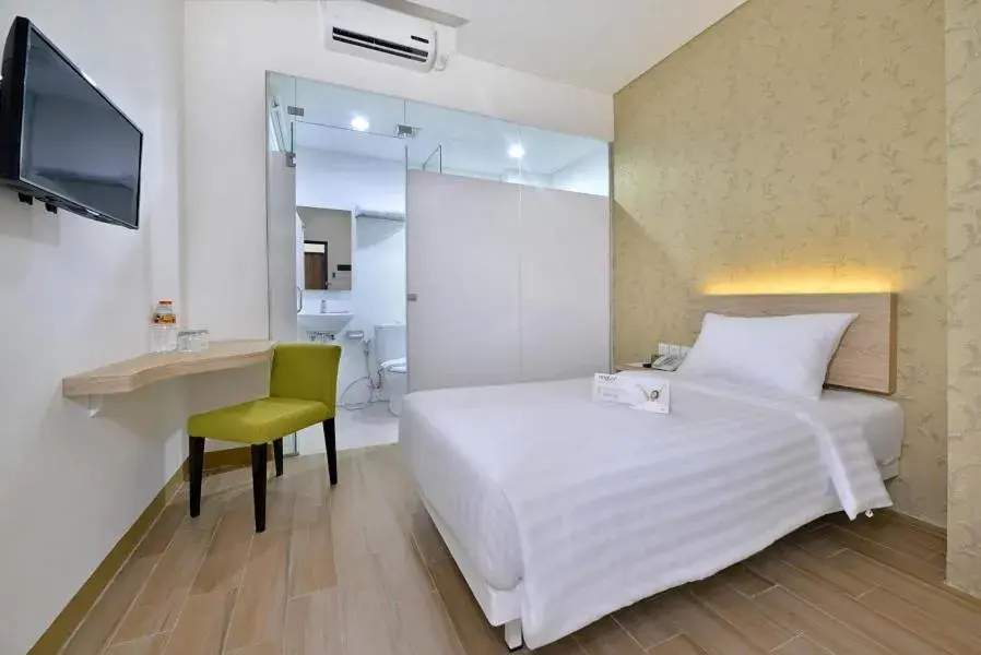 Bed in Whiz Hotel Falatehan Jakarta Bed in Whiz Hotel Falatehan Jakarta