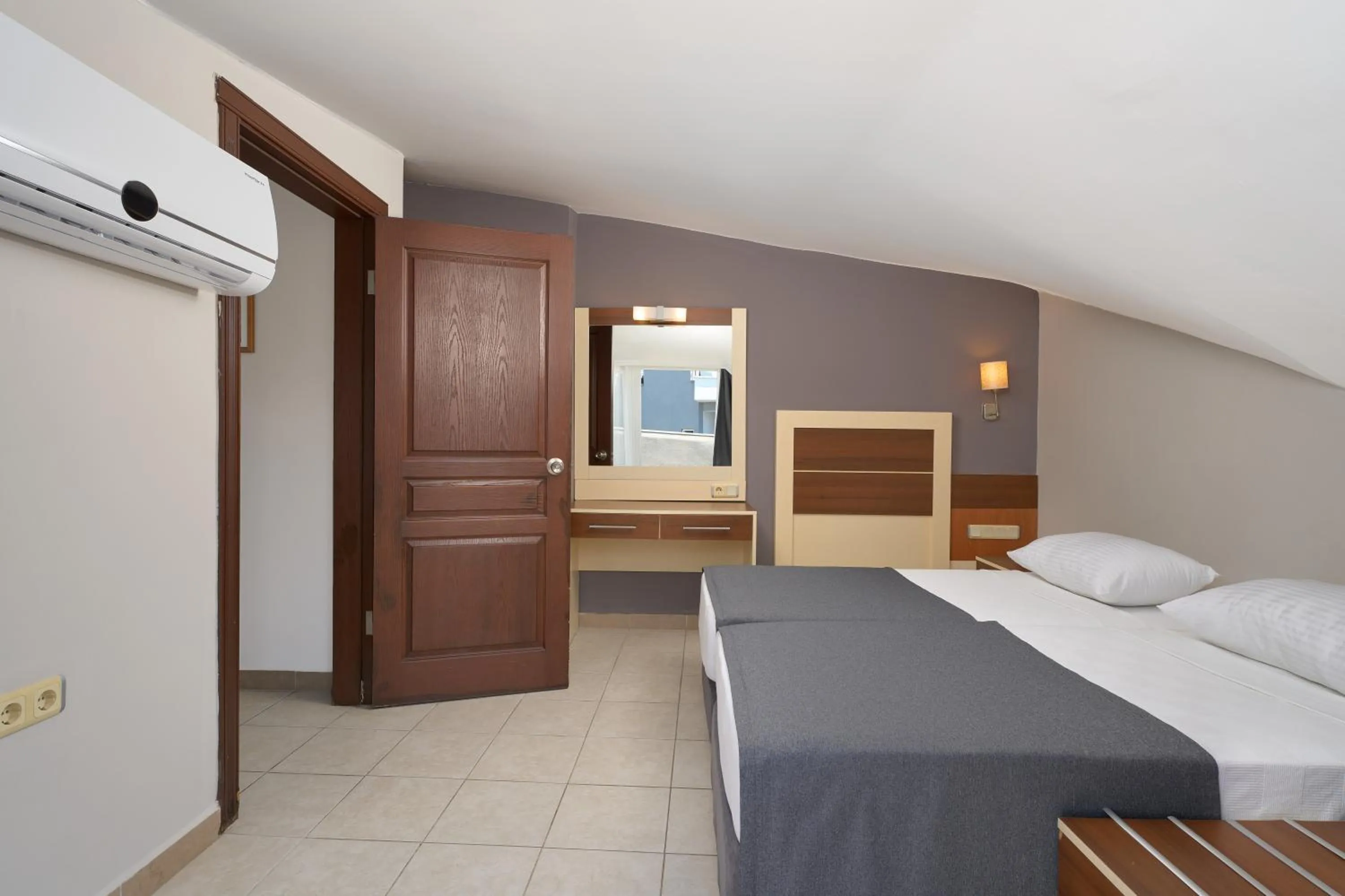 Bed in Kaila Krizantem Hotel