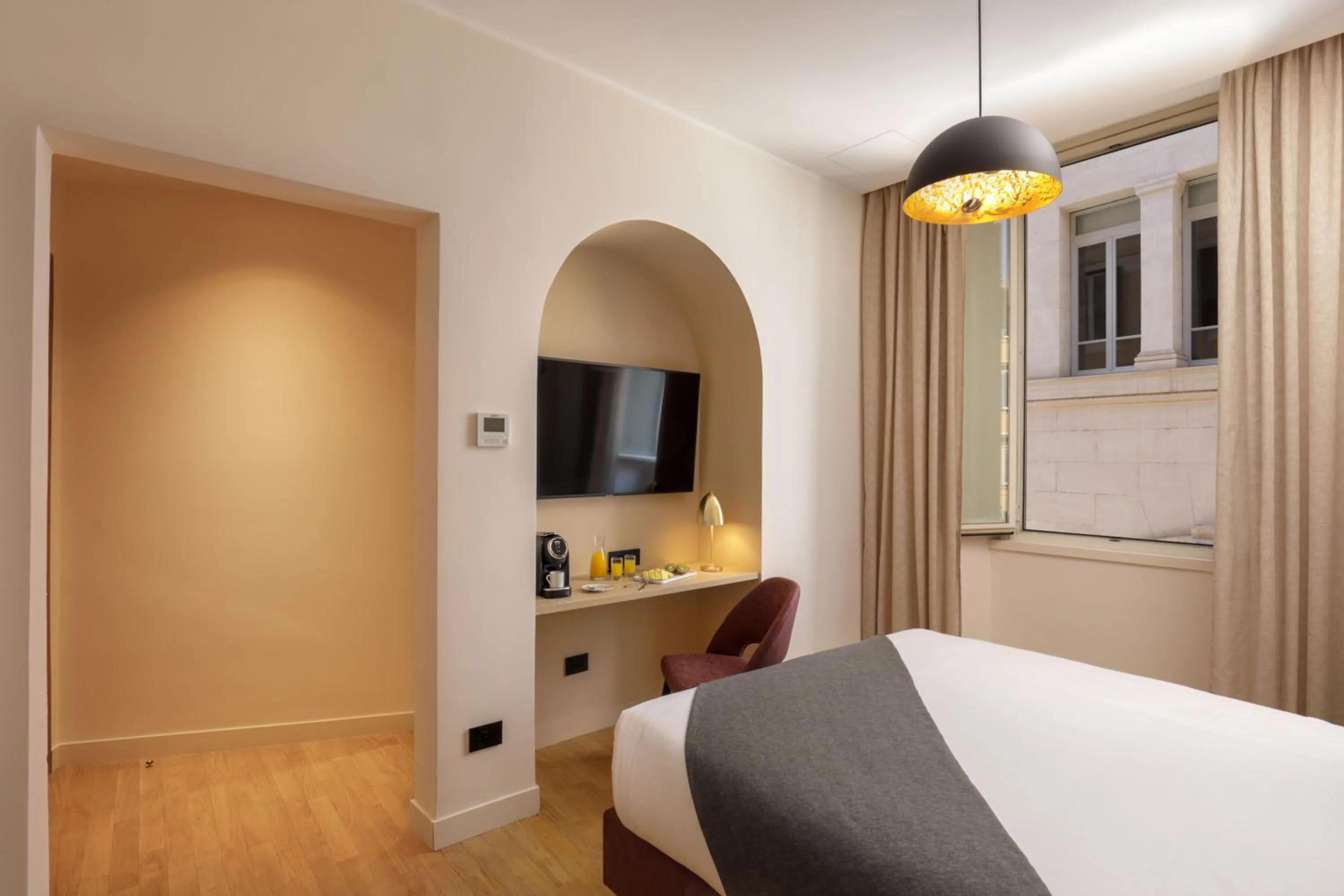 Bed in 9Hotel Cesari