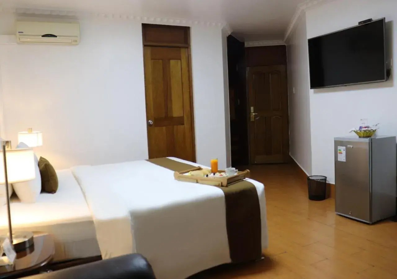 Bed in Inkari Suites Hotel Bed in Inkari Suites Hotel