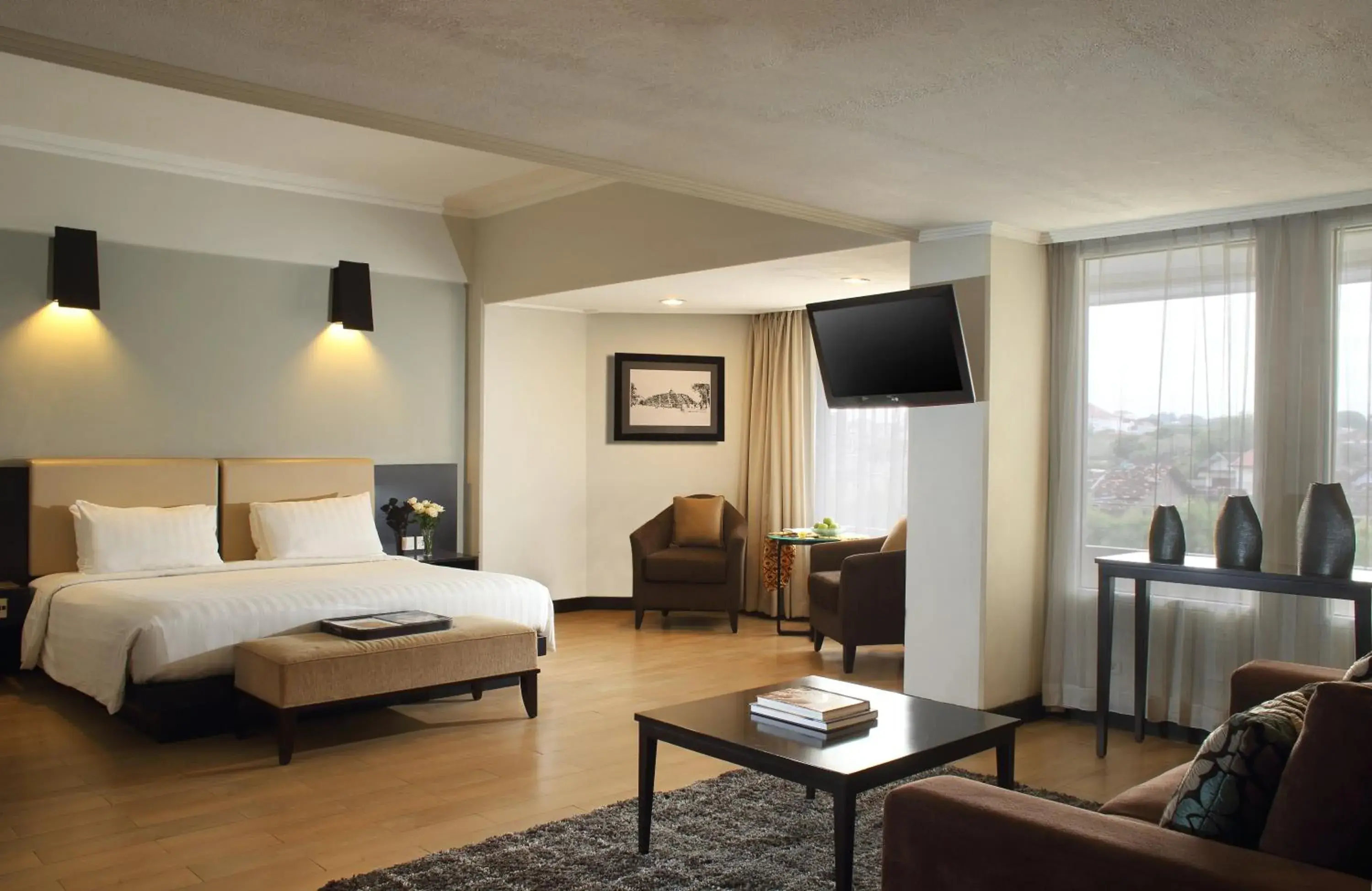 Living room, Bed in Hotel Santika Premiere Jogja Living room, Bed in Hotel Santika Premiere Jogja