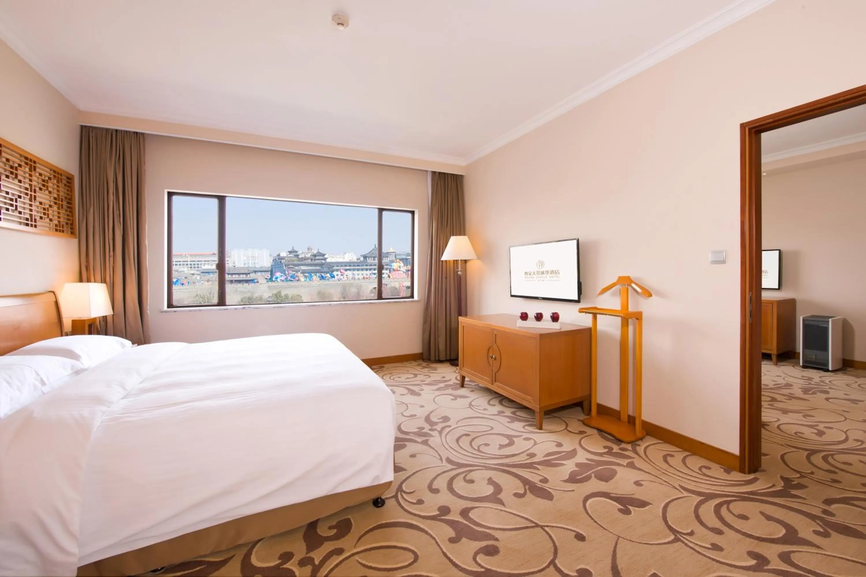 Photo of the whole room, Bed in Xi'an Dajing Castle Hotel Bell Tower & YONGNING Gate