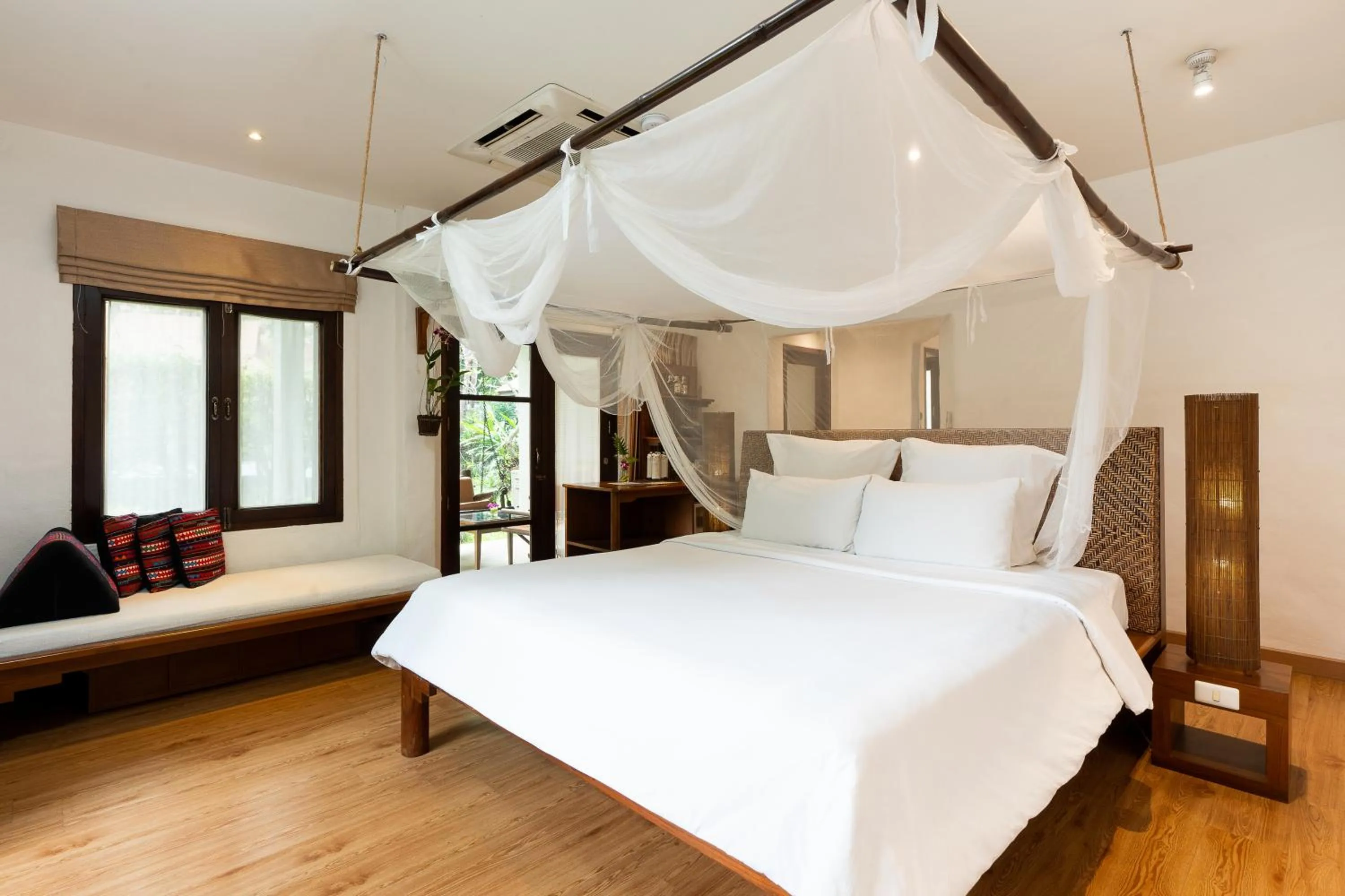 Bed in The Legend Chiang Rai Boutique River Resort & Spa