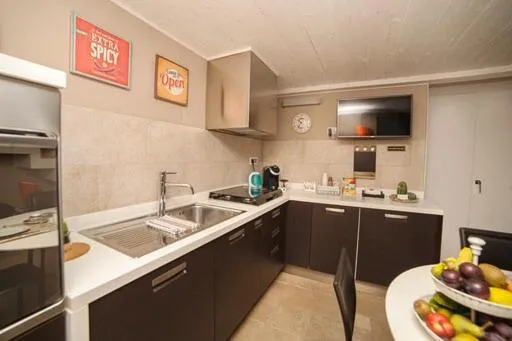 TV and multimedia in OroVerde Rooms & Suite nel cuore di Trani