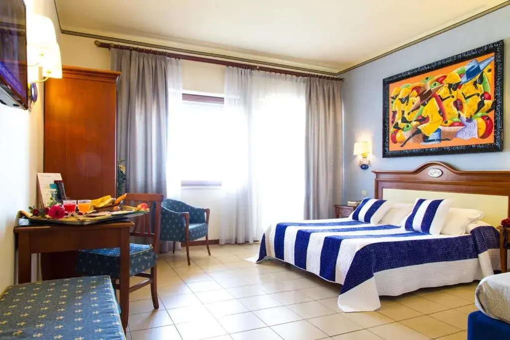 Triple Room with Sea View in Hotel Riva Del Sole Triple Room with Sea View in Hotel Riva Del Sole