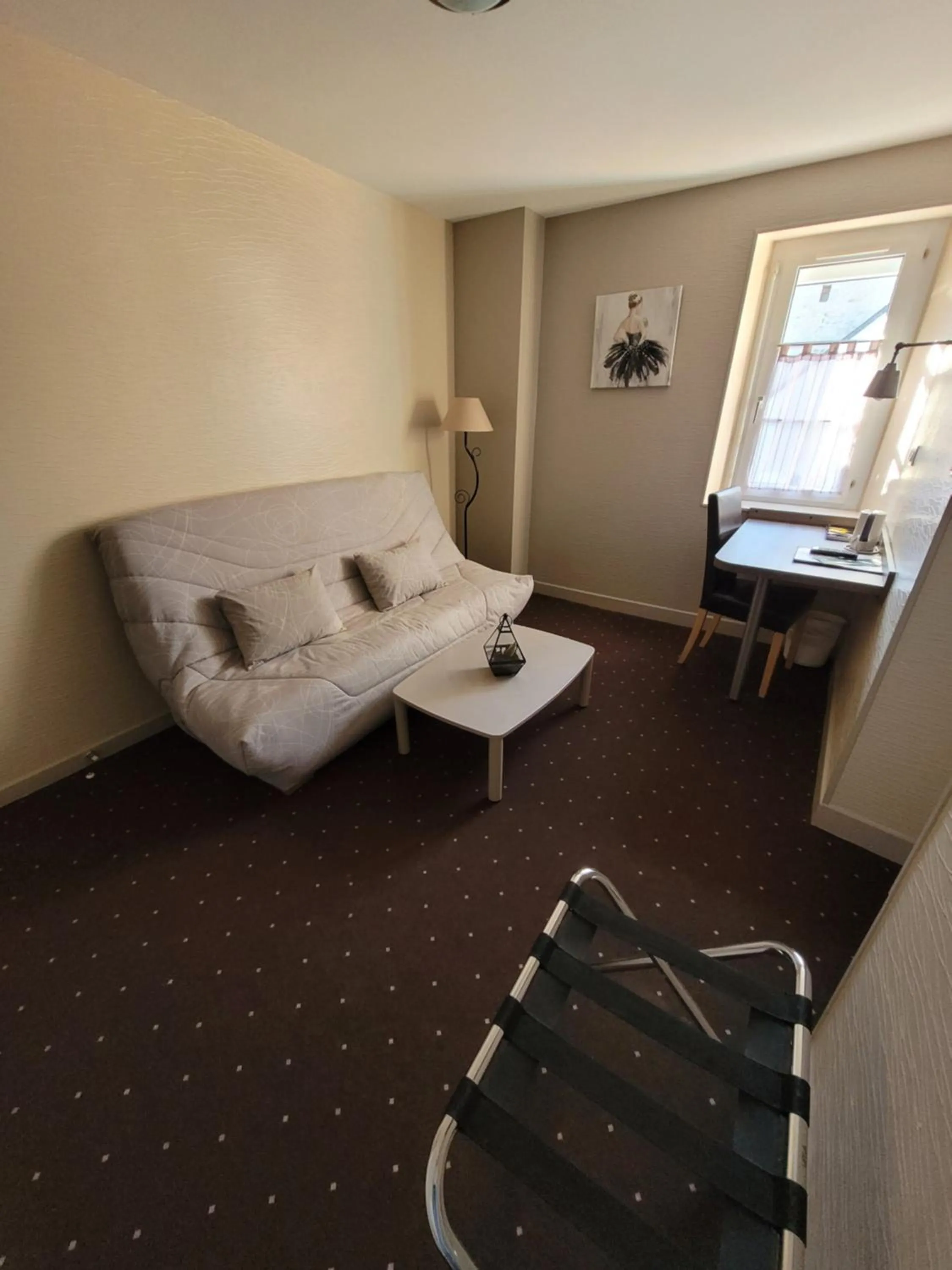 Living room in Hotel Logis Au Moyne de Saire