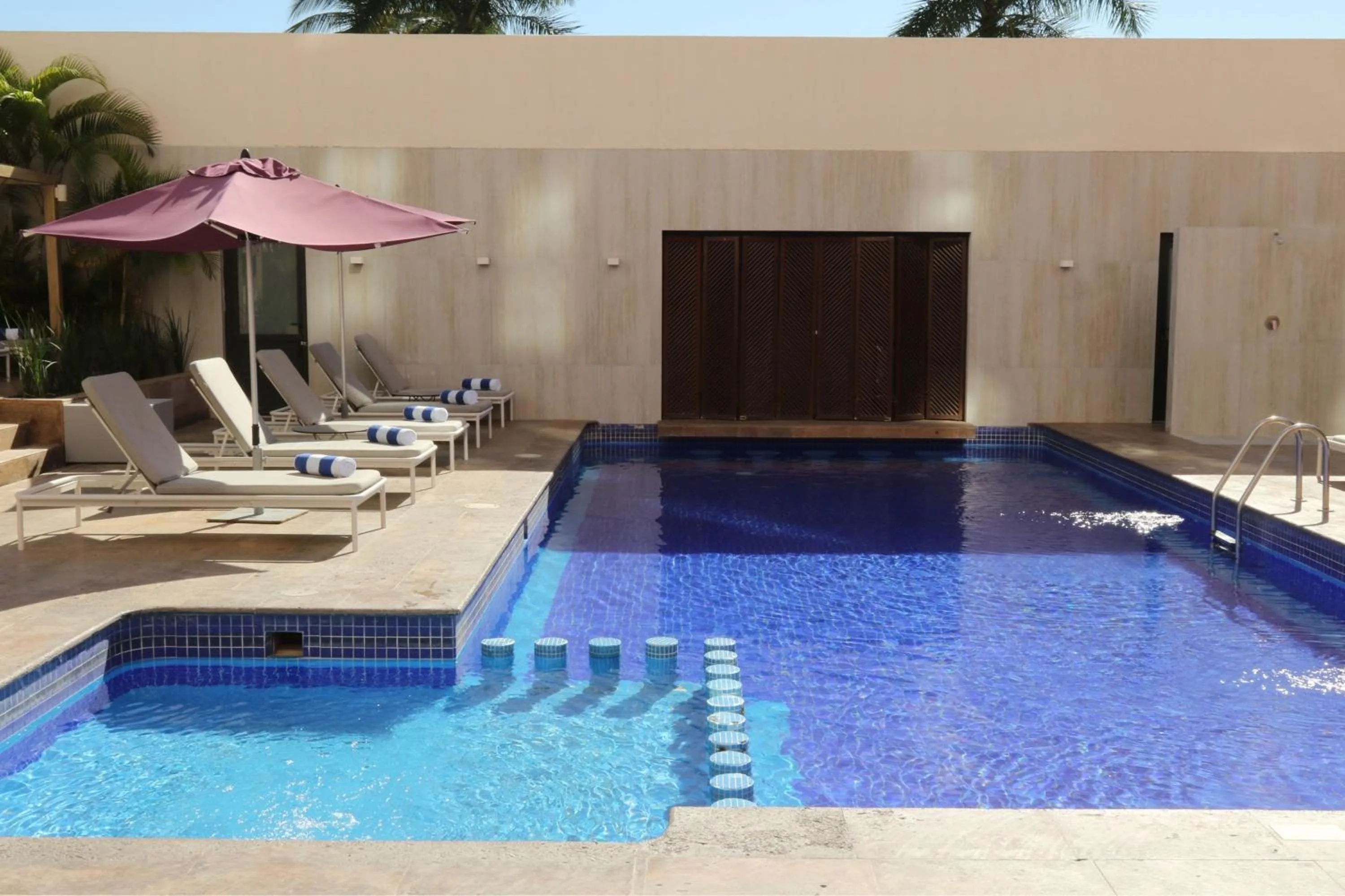 Swimming pool in City Express Plus by Marriott Puerto Vallarta