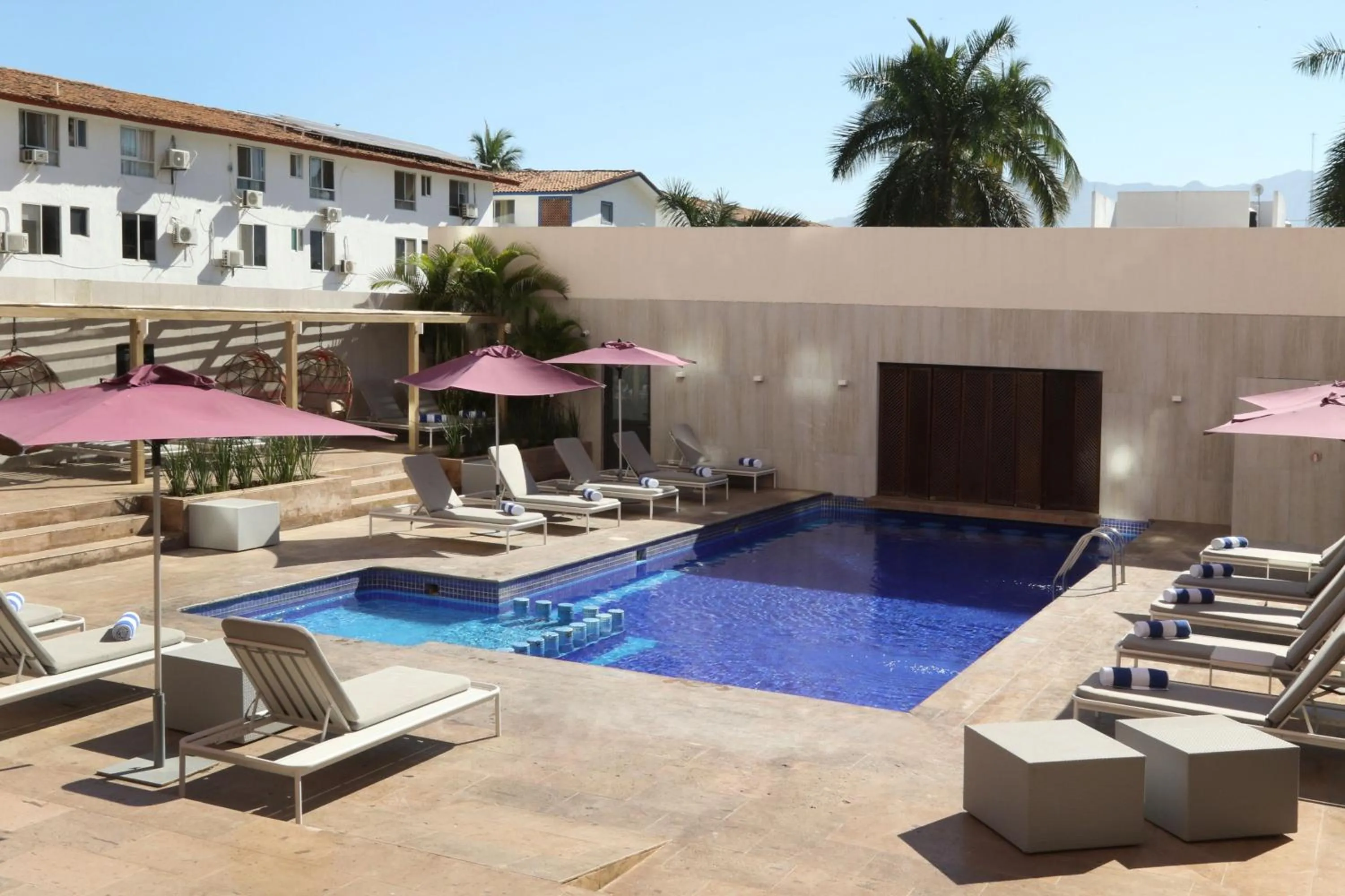 Swimming pool in City Express Plus by Marriott Puerto Vallarta