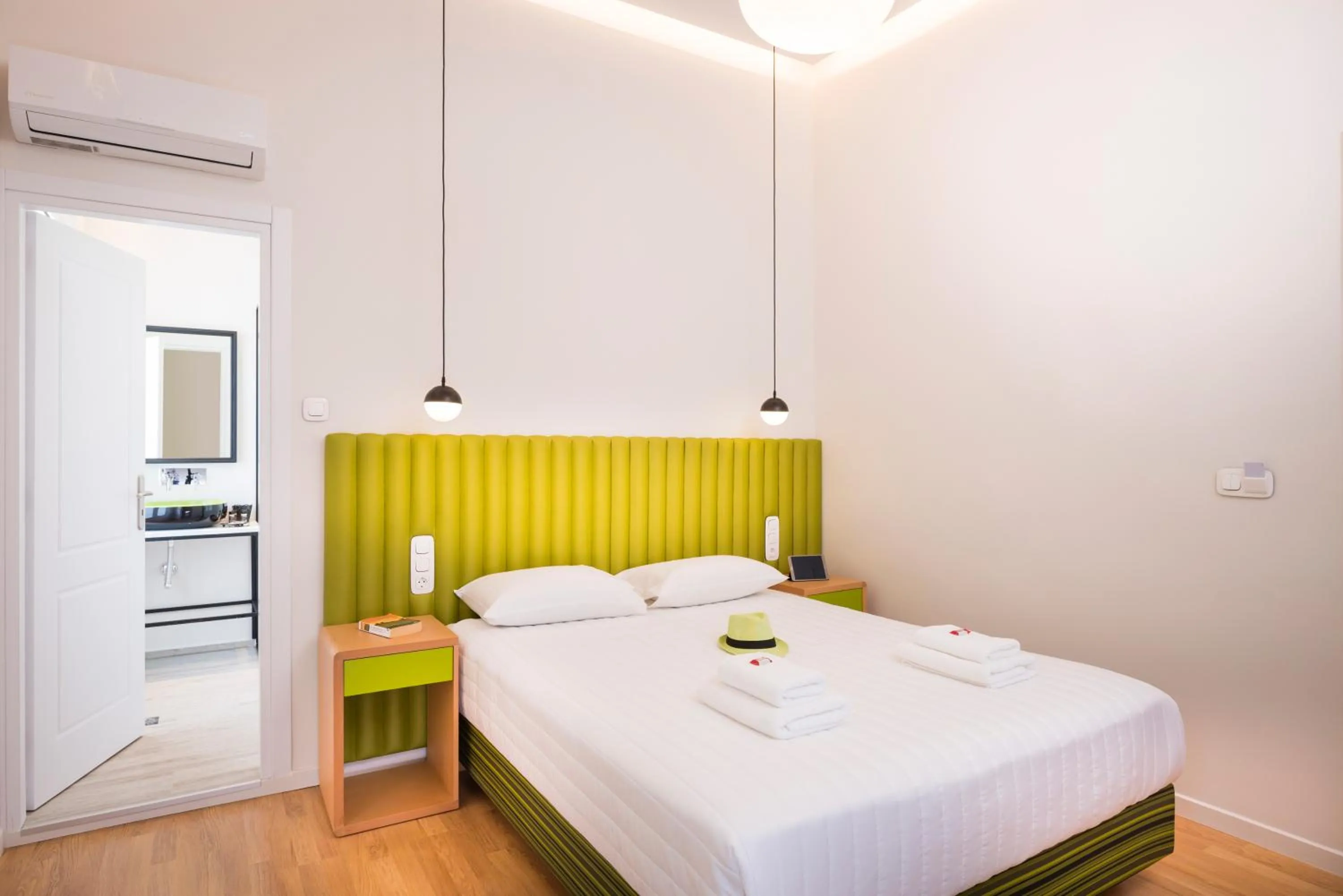 Bed in TheJoy City Suites