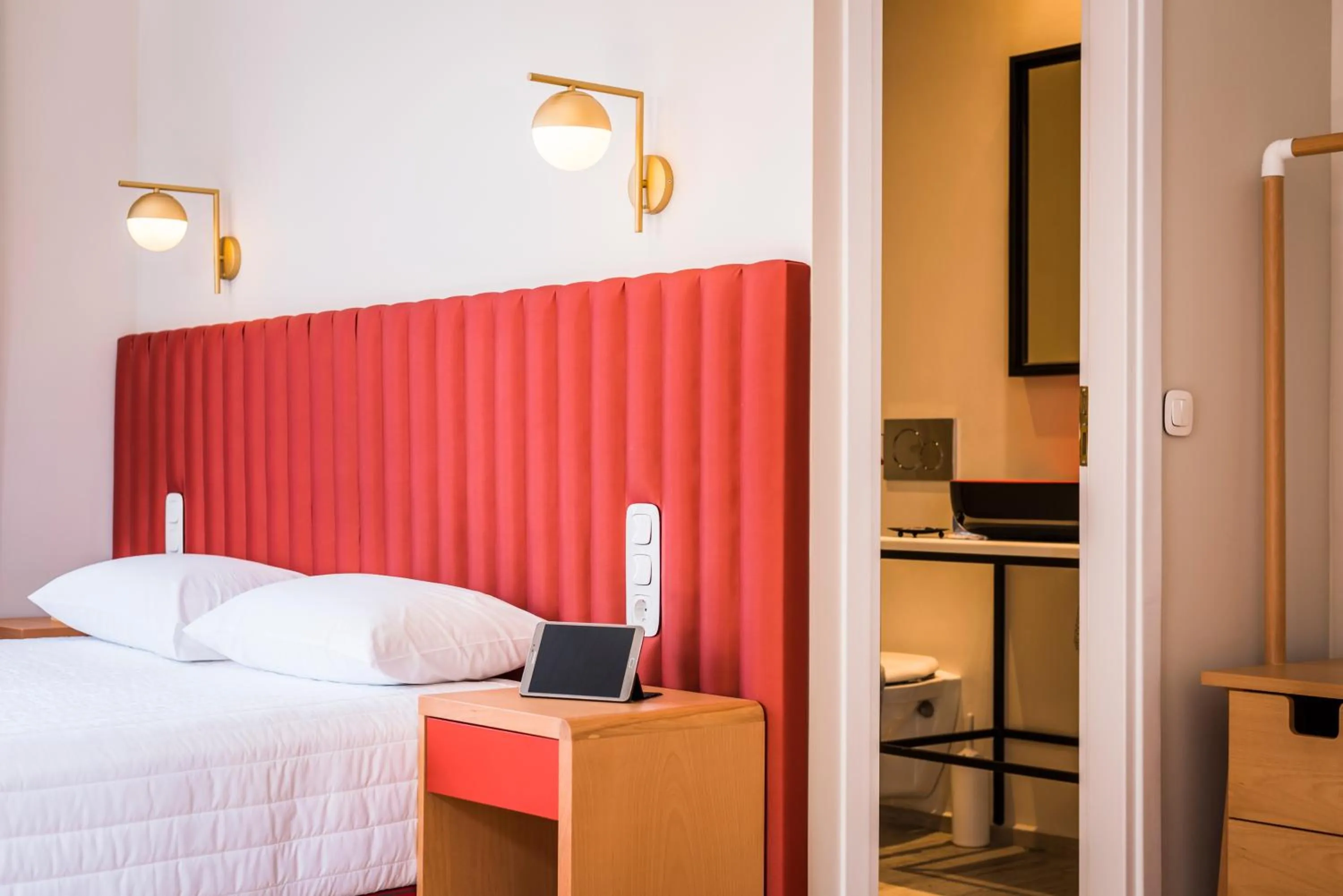 Bed in TheJoy City Suites