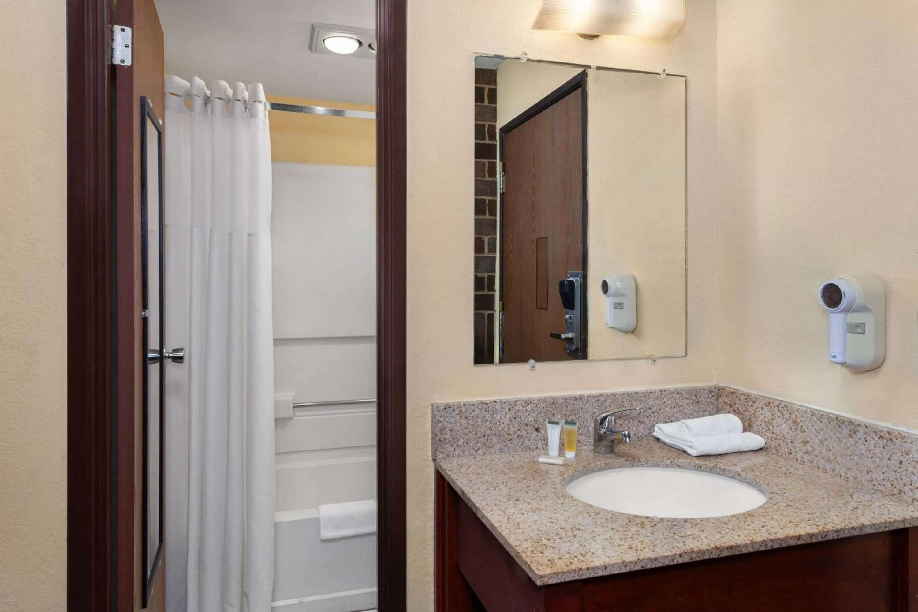 Bathroom in Days Inn by Wyndham Rockford I-90 Walking Distance to Casino