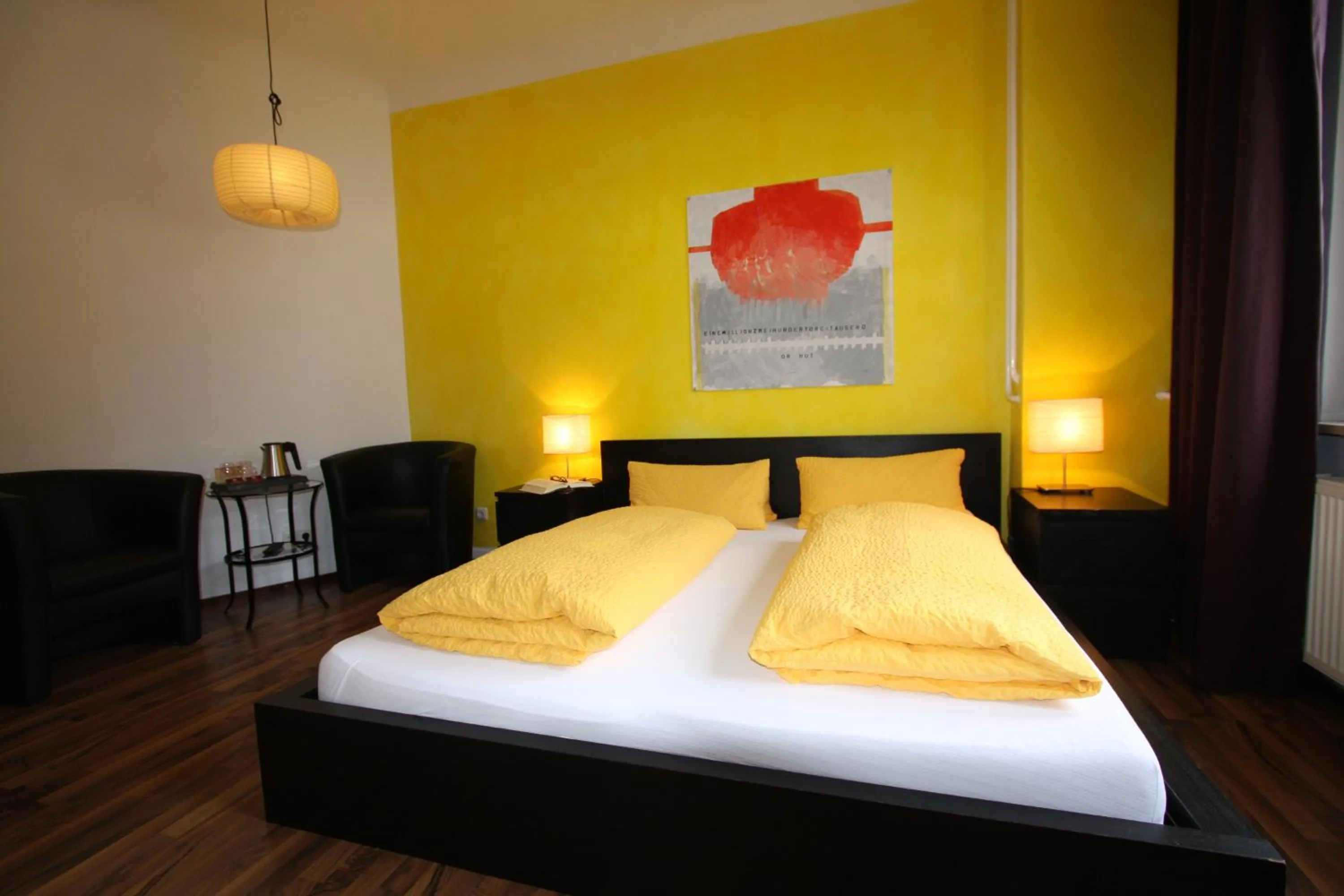 Photo of the whole room, Bed in Stadthotel Kleiner Berg
