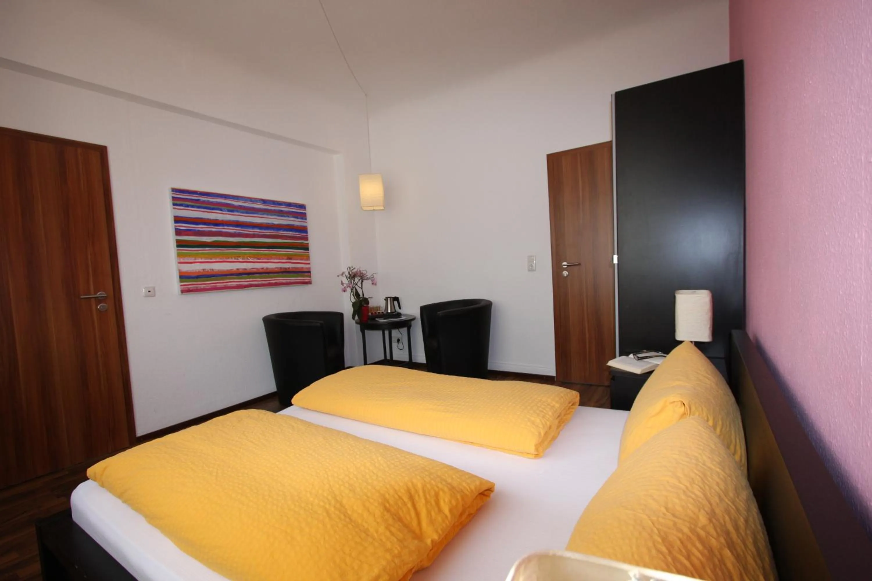 Bed in Stadthotel Kleiner Berg