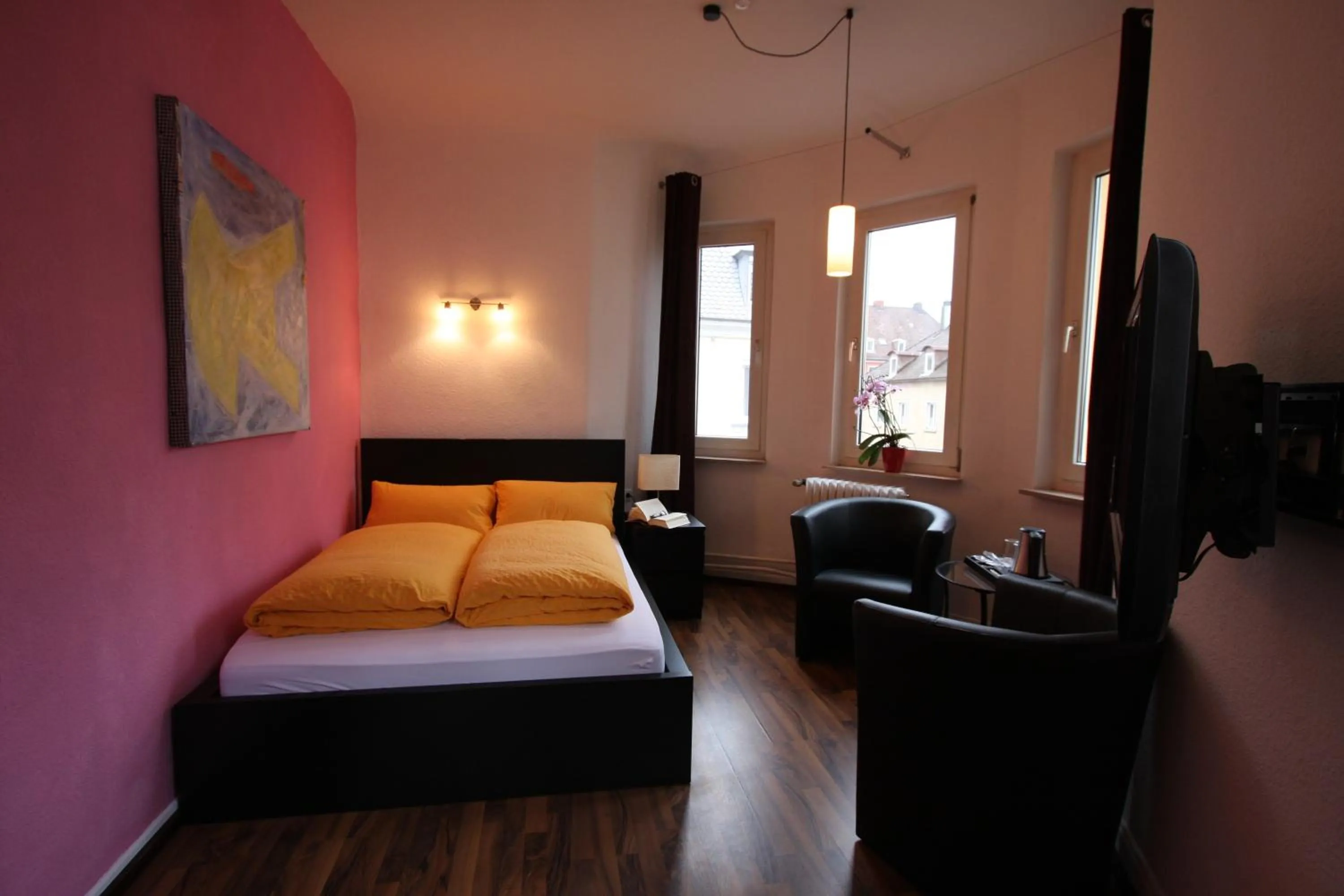 Photo of the whole room, Bed in Stadthotel Kleiner Berg