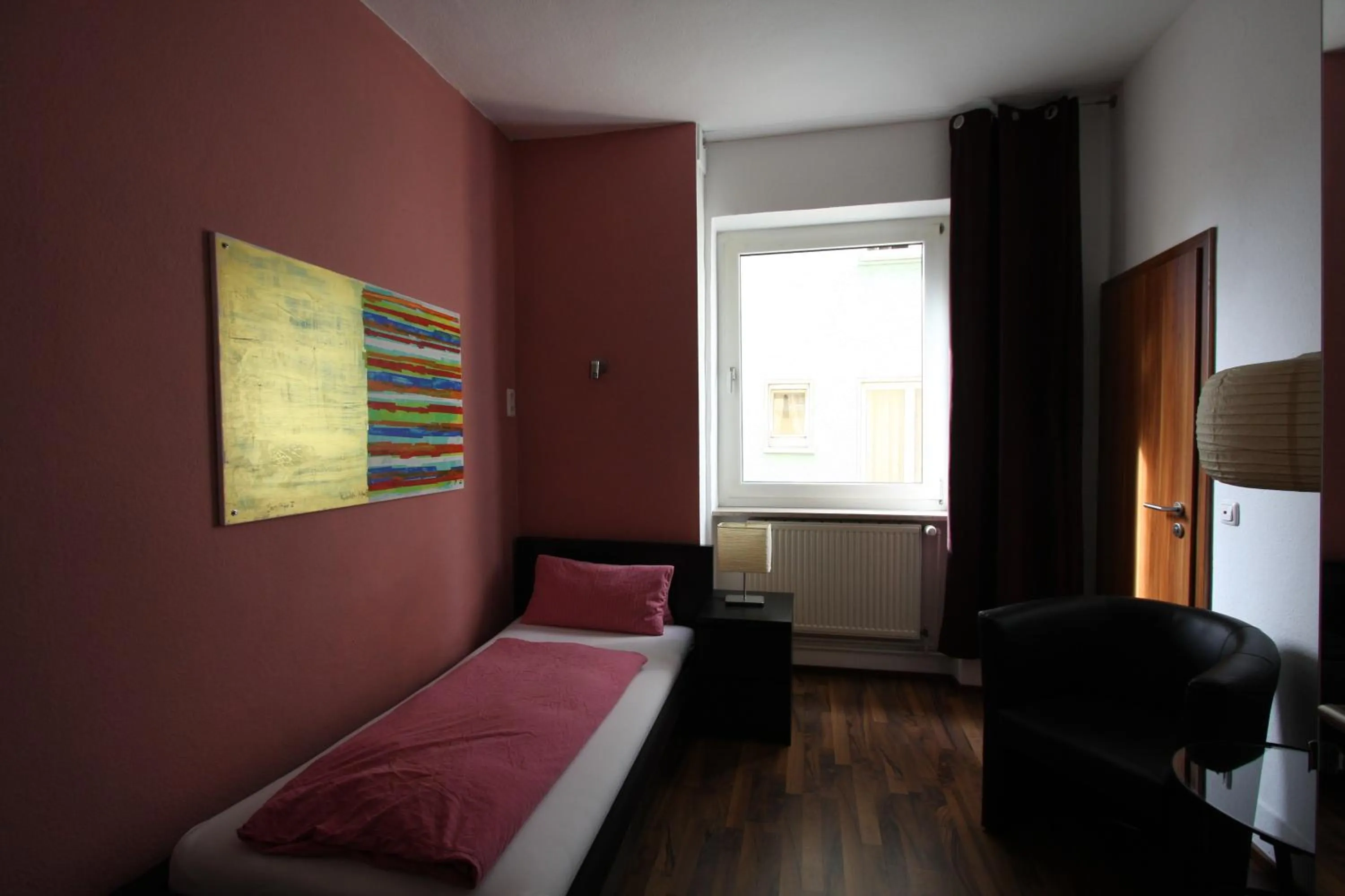 Photo of the whole room, Bed in Stadthotel Kleiner Berg