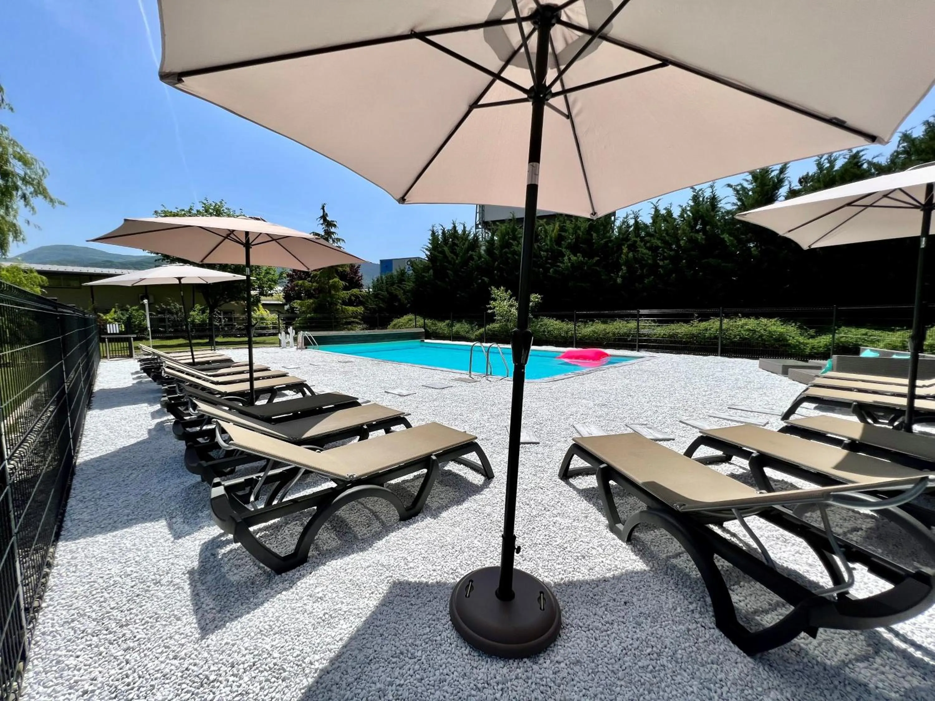 Swimming pool in The Originals Boutique, Hôtel Le Cap, Gap Sud