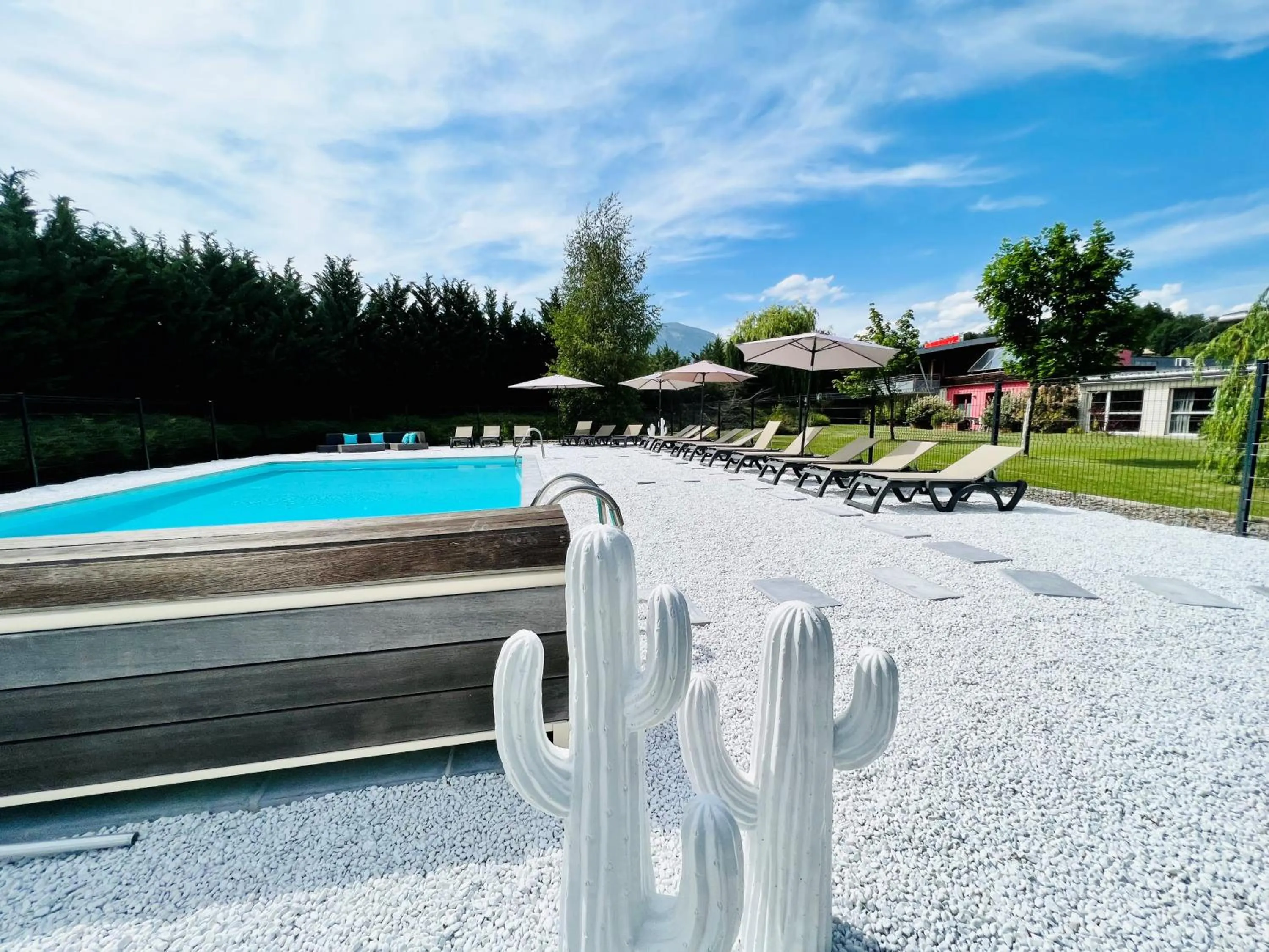 Swimming pool in The Originals Boutique, Hôtel Le Cap, Gap Sud