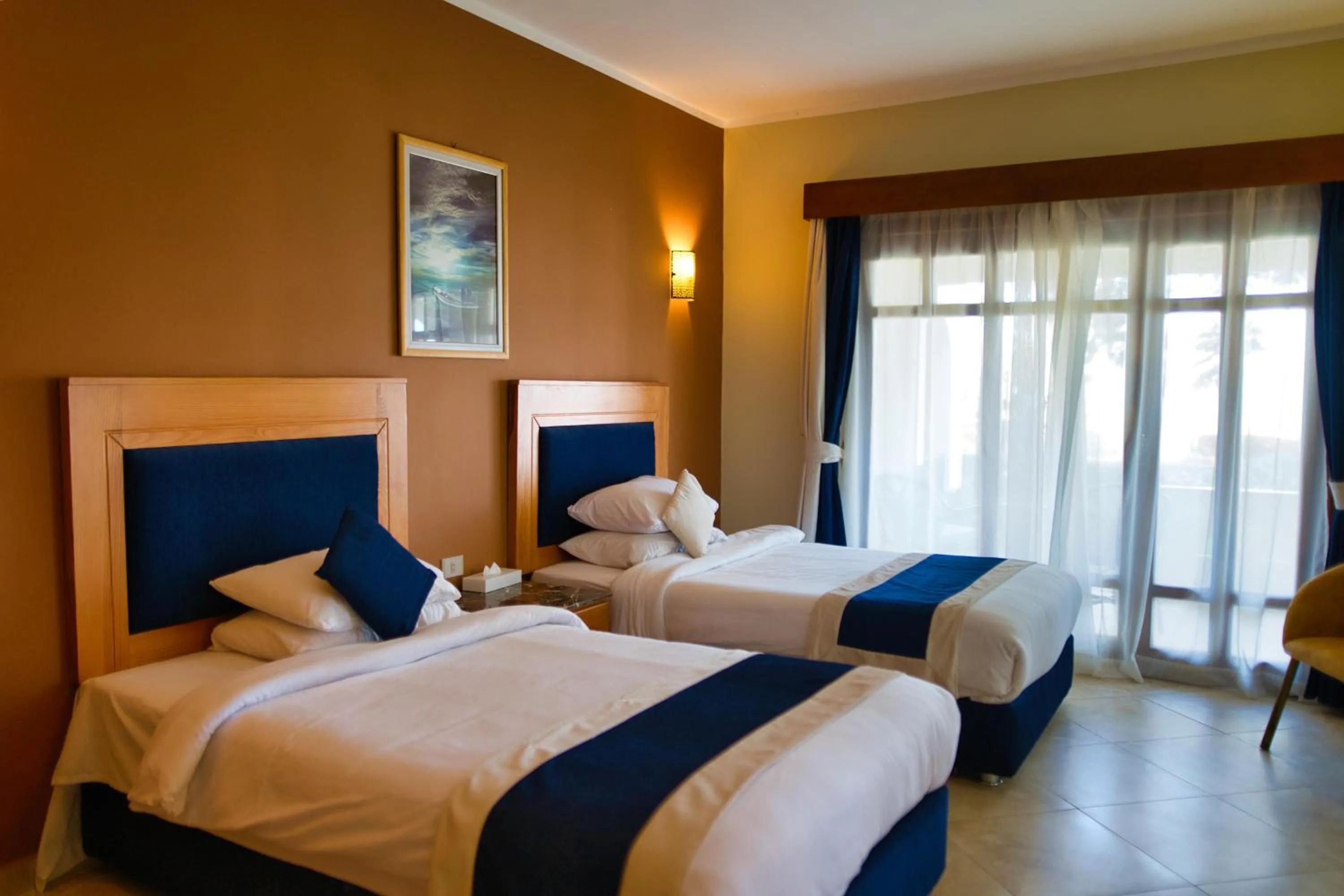 Photo of the whole room, Bed in Tropitel Dahab Oasis