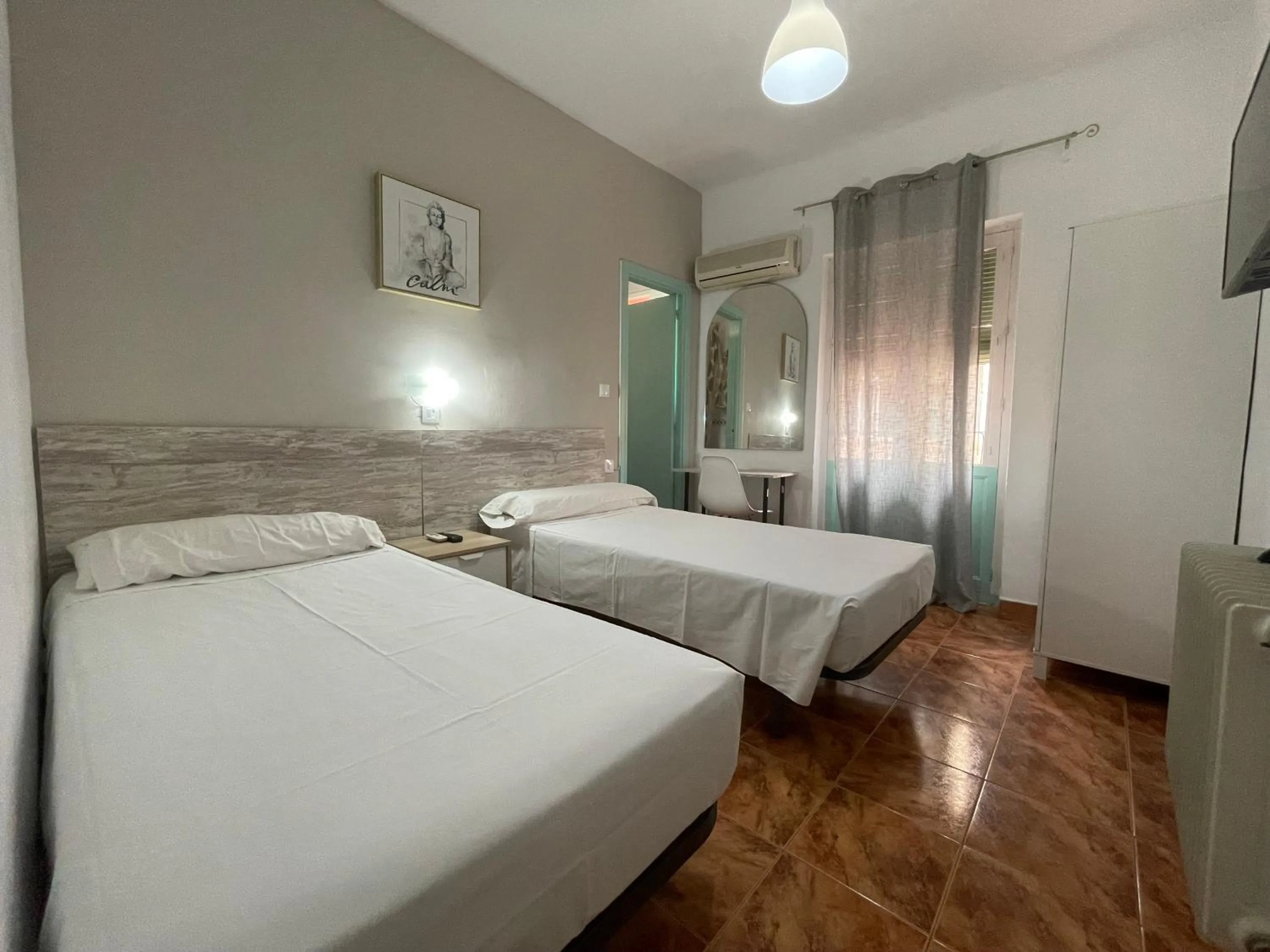 Bed in Pensión Duquesa Bed & Breakfast