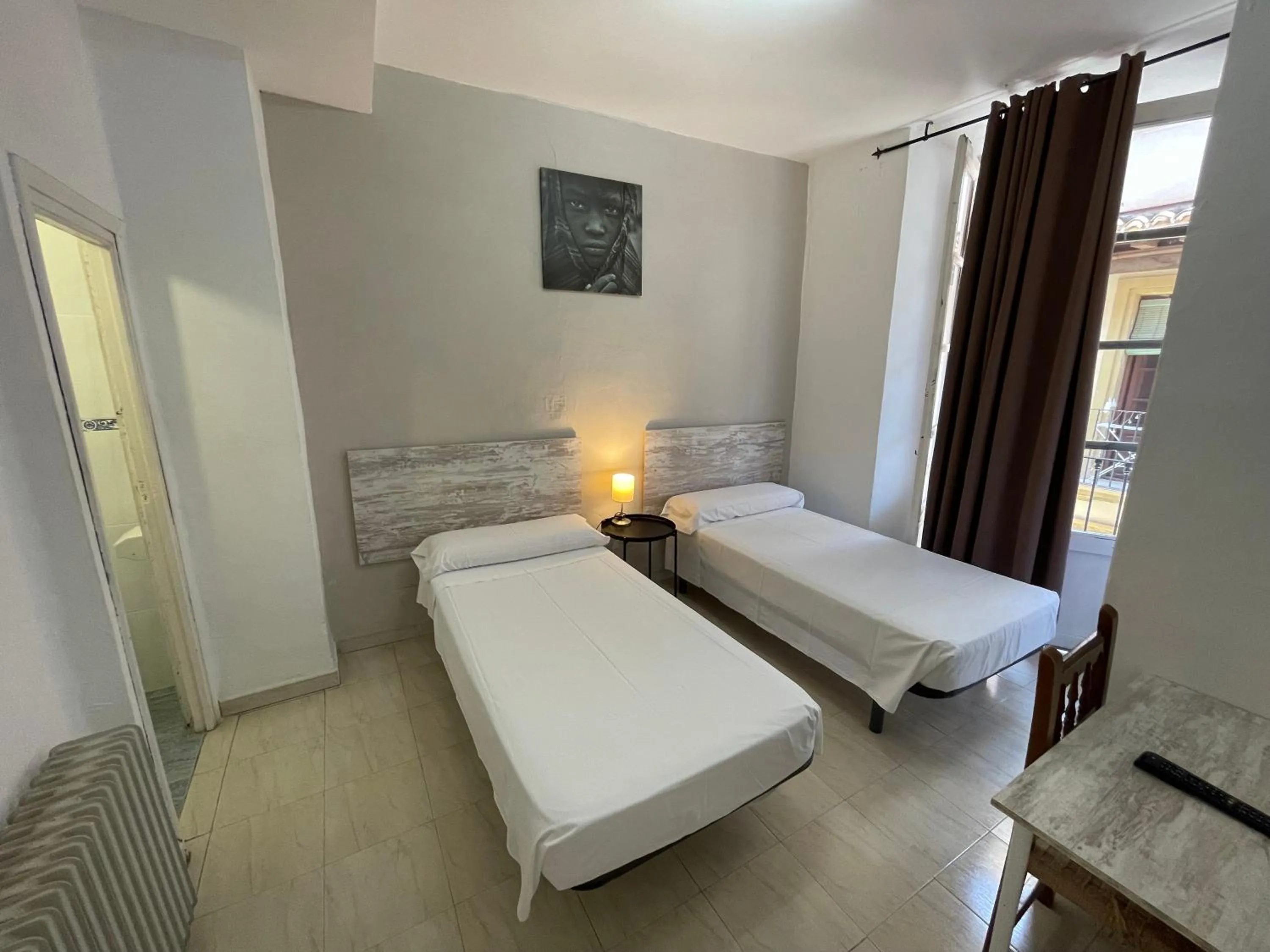 Bed in Pensión Duquesa Bed & Breakfast