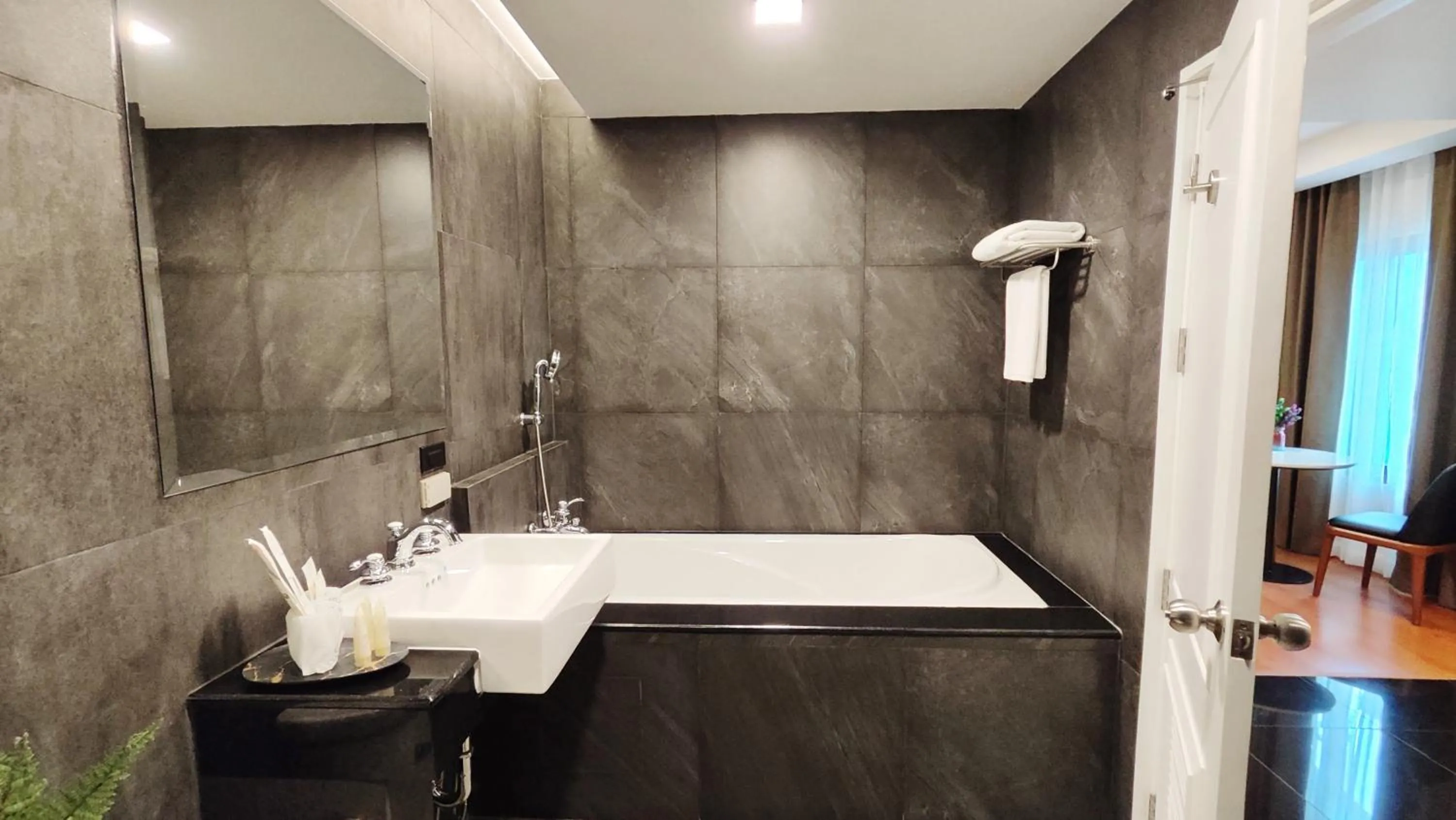 Bathroom in The Bless Hotel and Residence