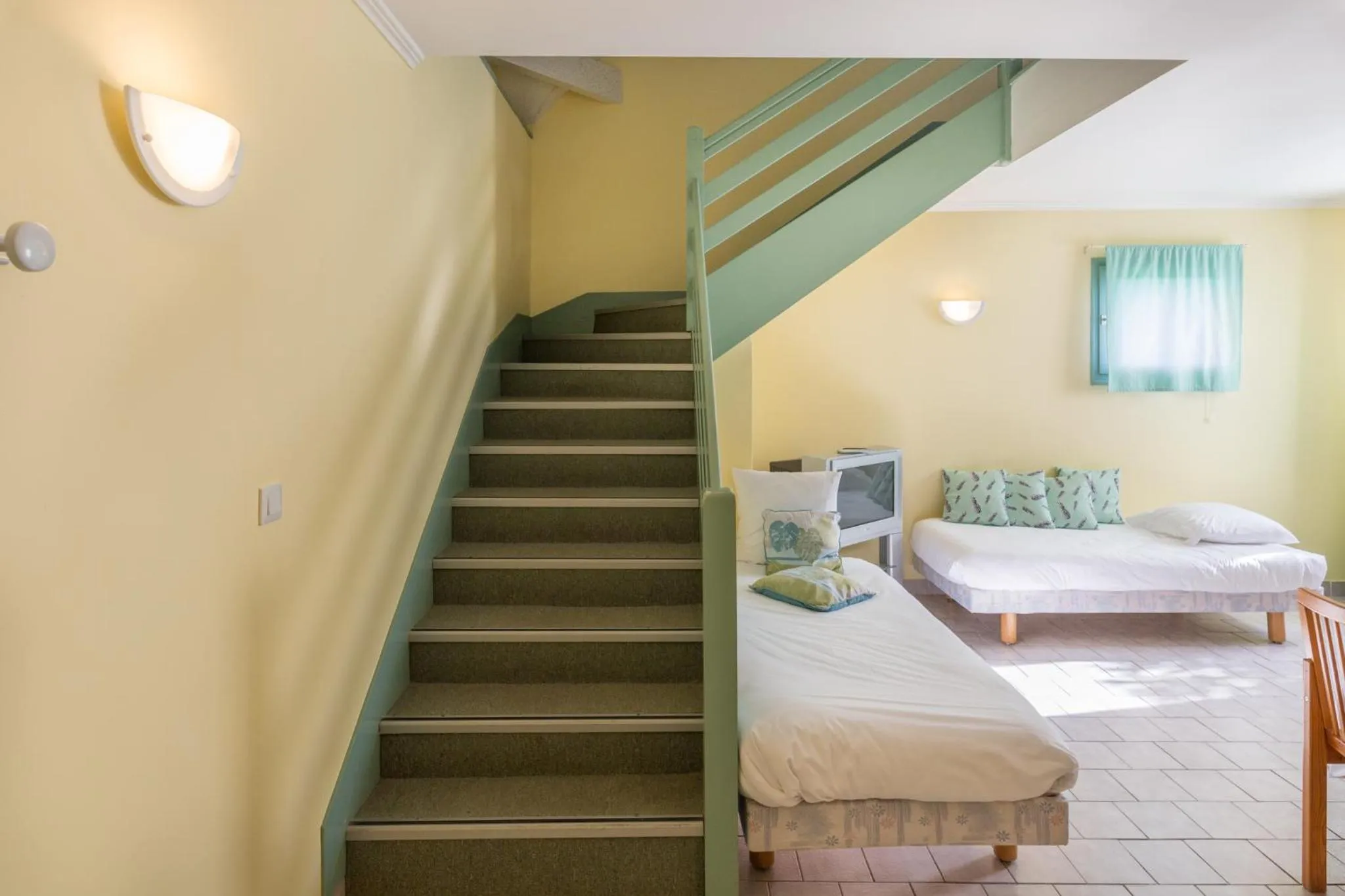 Bed in Logis Hotel Le Nuage